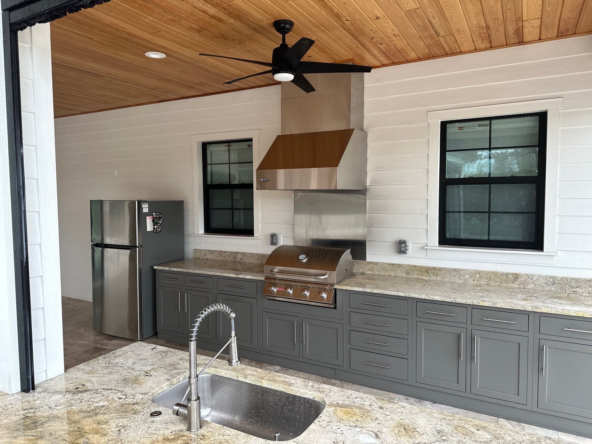 Complete Two-Story House Wash and Driveway Cleaning in Winding River Community, Bradenton, FL by Sunshine AquaWash