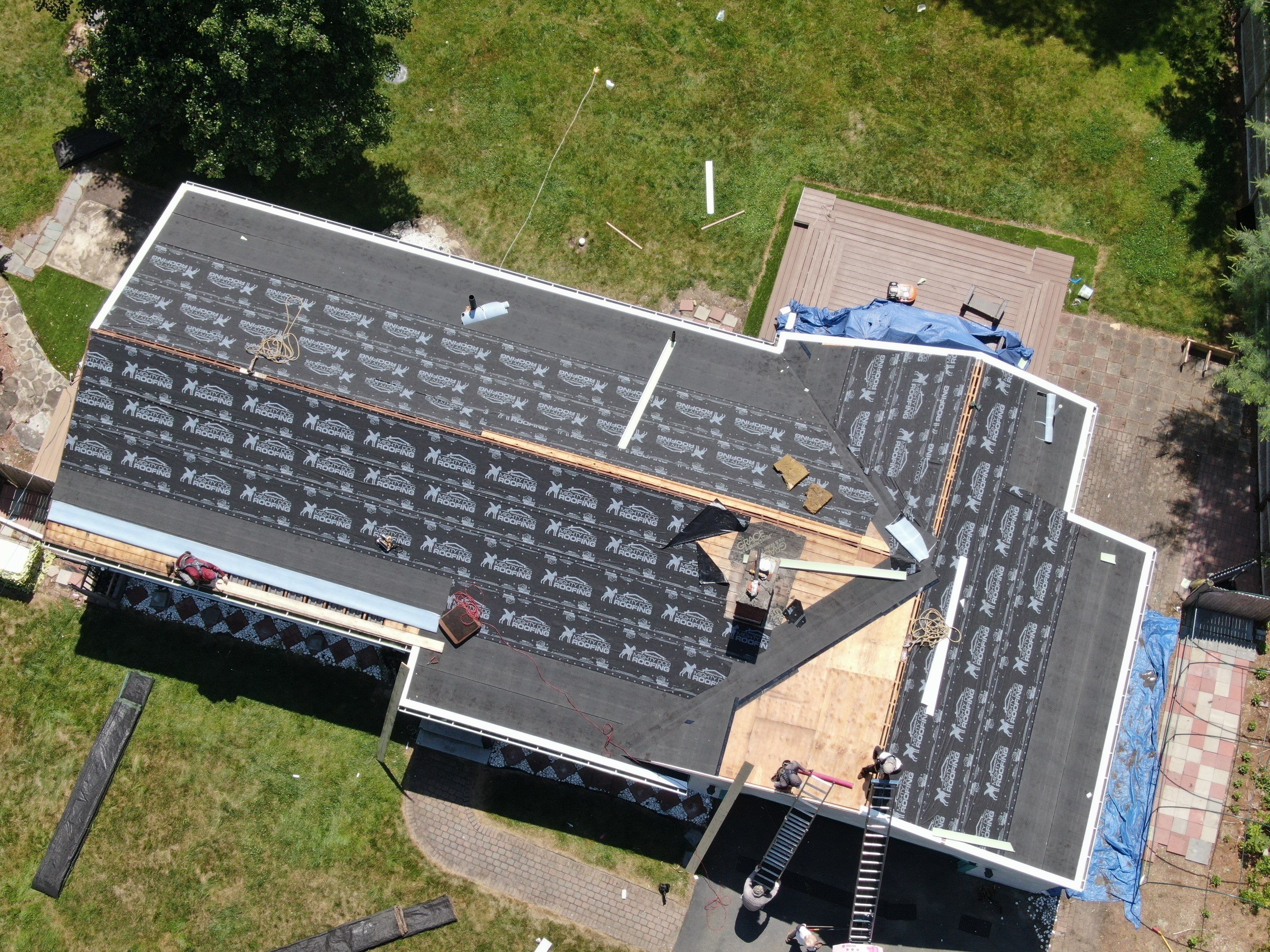 Roof Replacement with Gutter Guards – Westford, MA by Mighty Dog Roofing of Greater Middlesex County