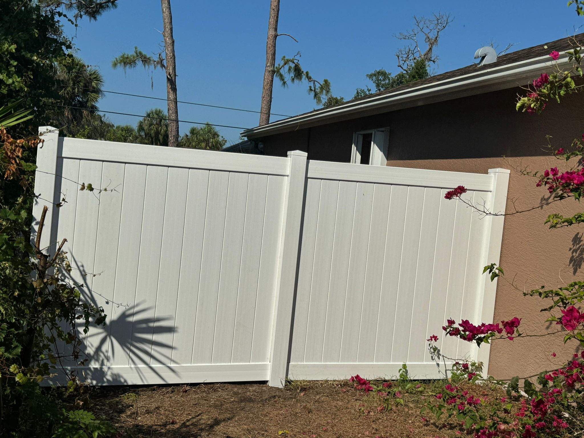 White Vinyl Privacy Fence and Gate Repair in North Port by True Fence LLC