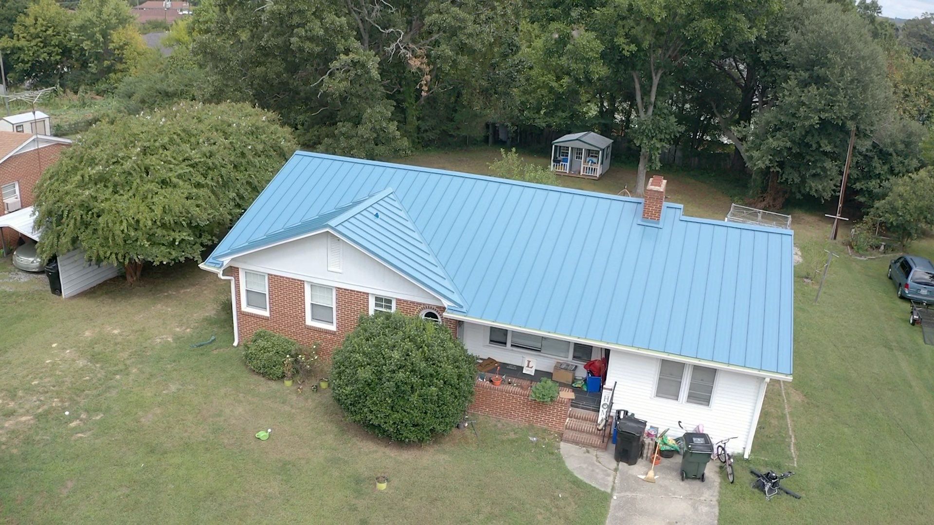 Carolina Blue Standing Seam Roof by Just In Time Roofing and Restoration