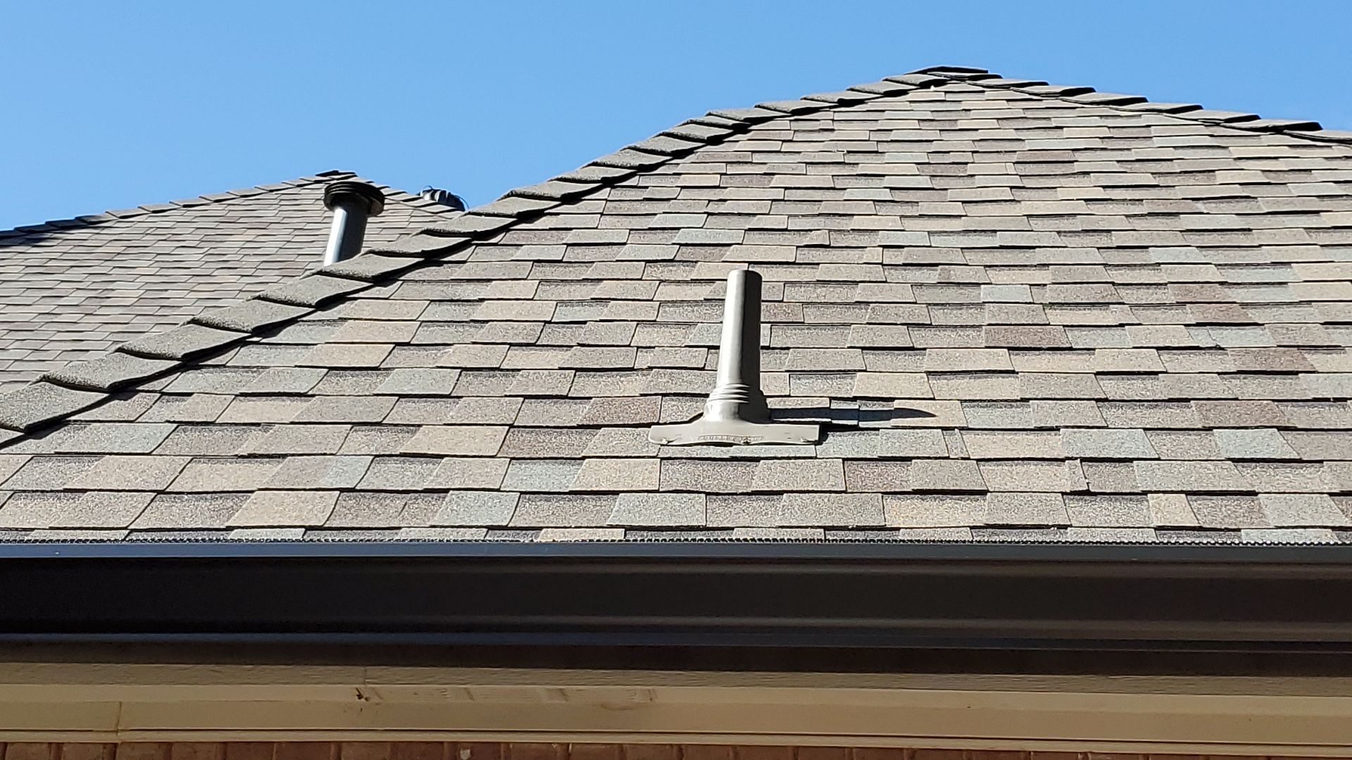 Residential Roofing Installation using ATLAS StormMaster Shake by Harvey Roofing & Construction