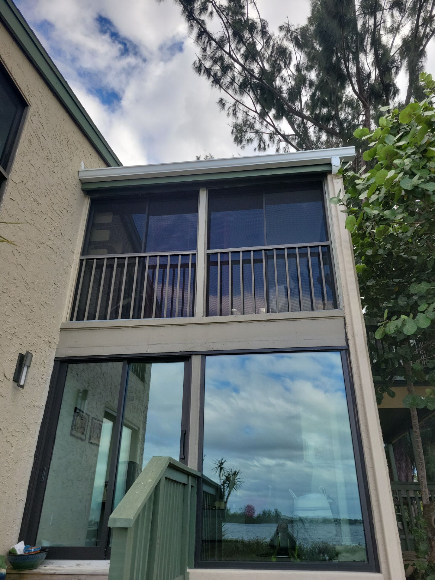 White Gutters Repair and Installation in Sarasota FL by Gutter Professors