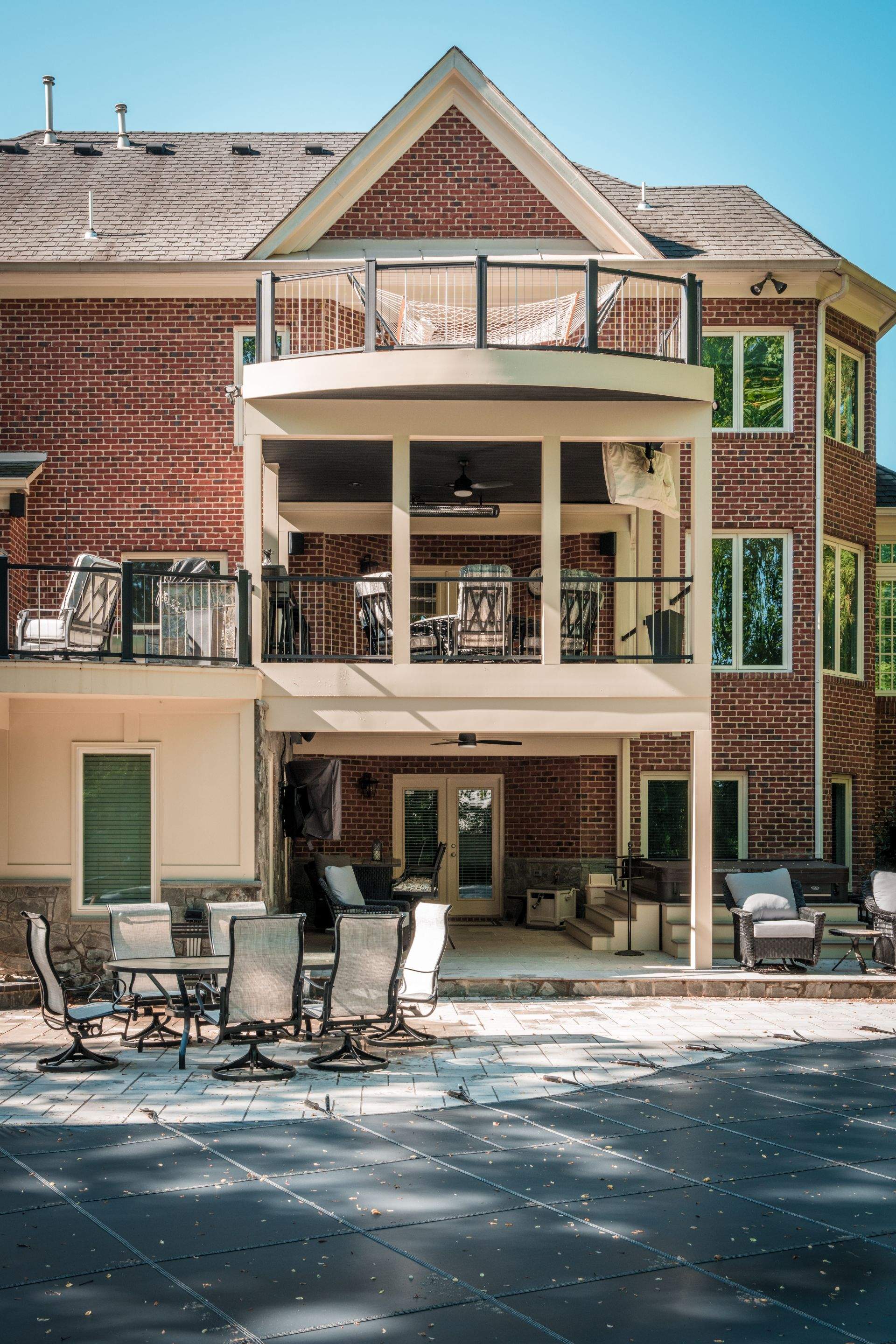 Custom Multi-Level Deck, Outdoor Kitchen & Pool Patio in McLean, VA by Sunburst Construction Inc