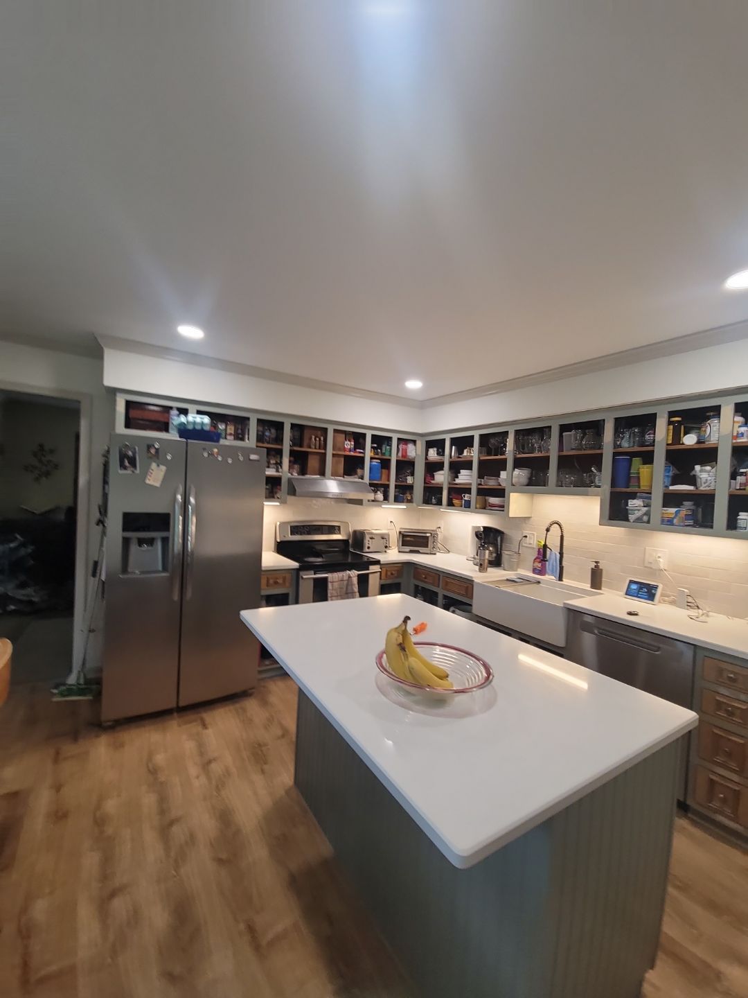 A Pathway to Personality – A Two-Tone Kitchen Transformation in Apex by Elite Remodeling and Design LLC