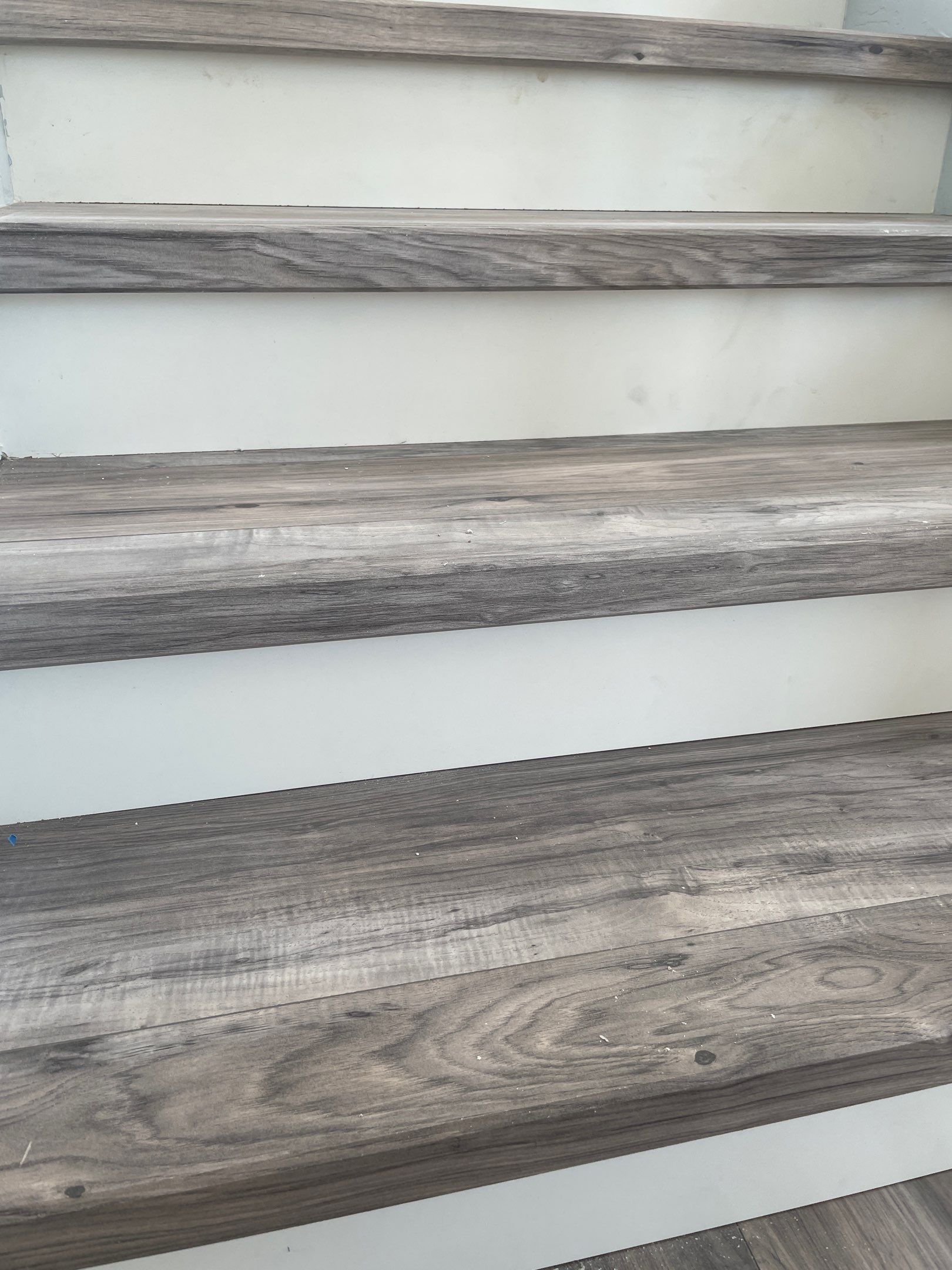 Laminate Staircase and Flooring  by Footprints Floors of Chandler 