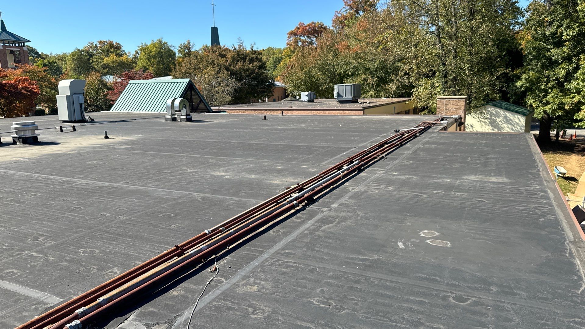 Church Roof Installation using GACO Flex Silicone by ExteriorPros