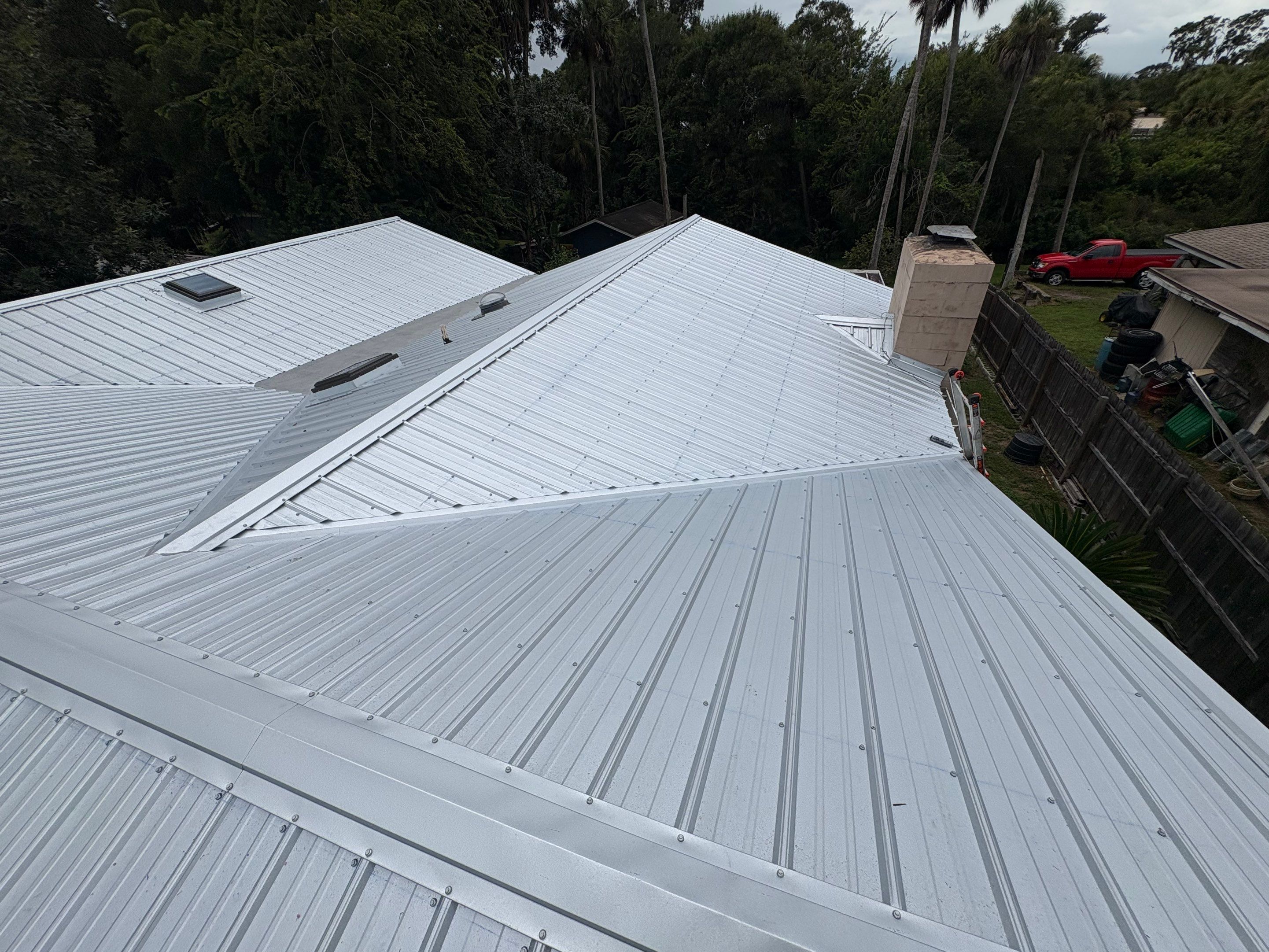 Residential Metal Roofing Installation with Ultra Rib Panels in New Smyrna Beach by Pinnacle Roofing Group