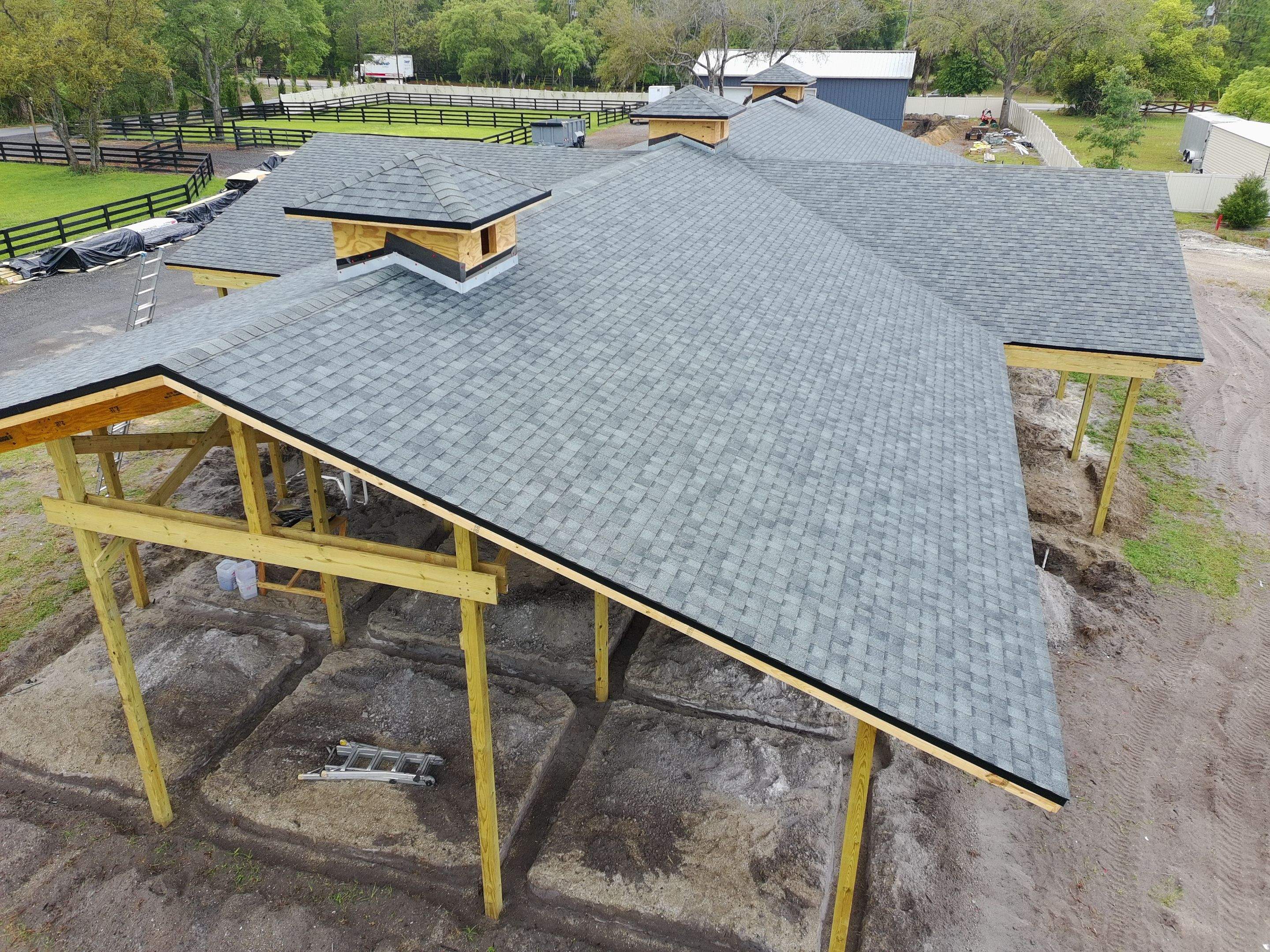 Custom Post-Frame Horse Barn and Shingle Roof Installation in Geneva by Fortified Roofing Solutions Corp.