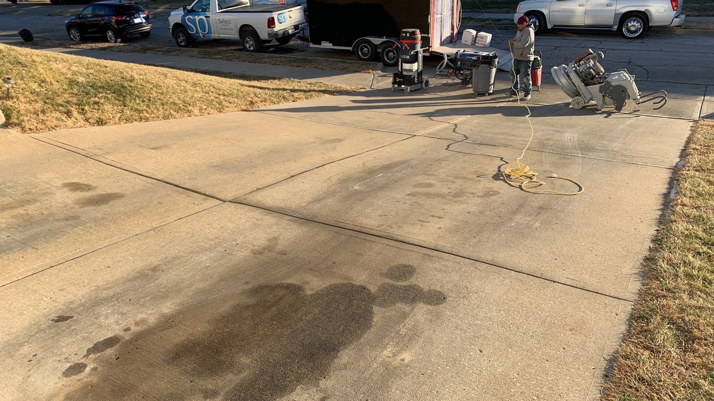 Driveway using Slate Stone by Select Painting, Coatings & Garage Cabinets