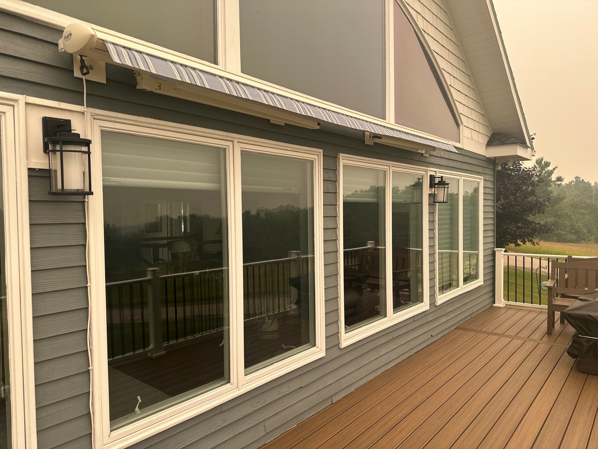 Sunesta Retractable Awning Installation over Charlevoix Deck by Rainbow Seamless Systems