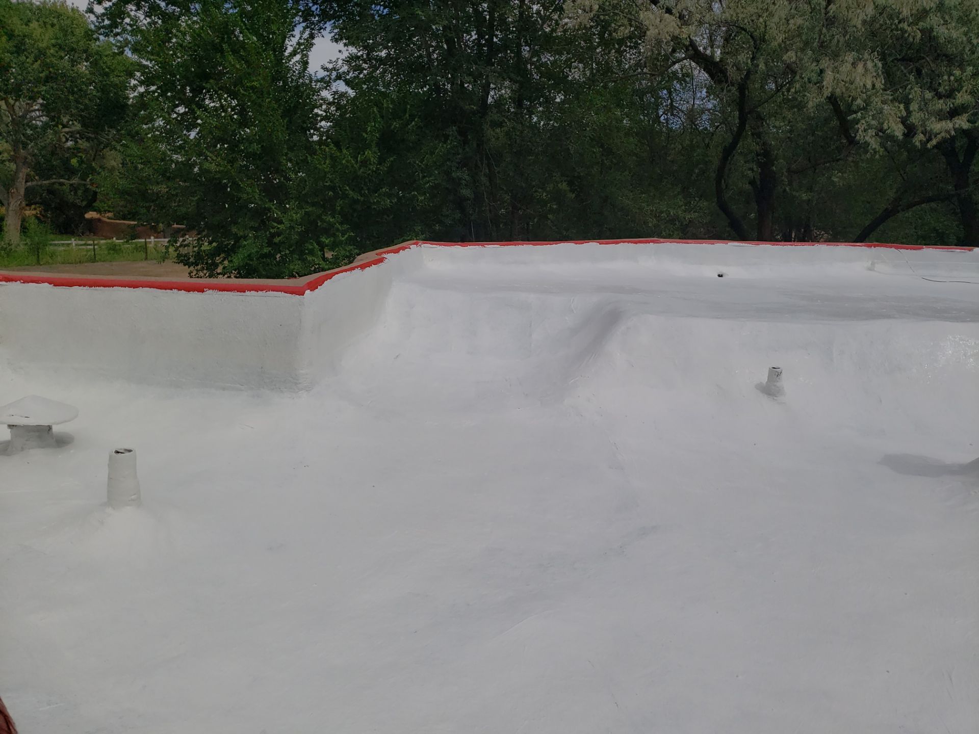 Residential roof application by SPF Services 