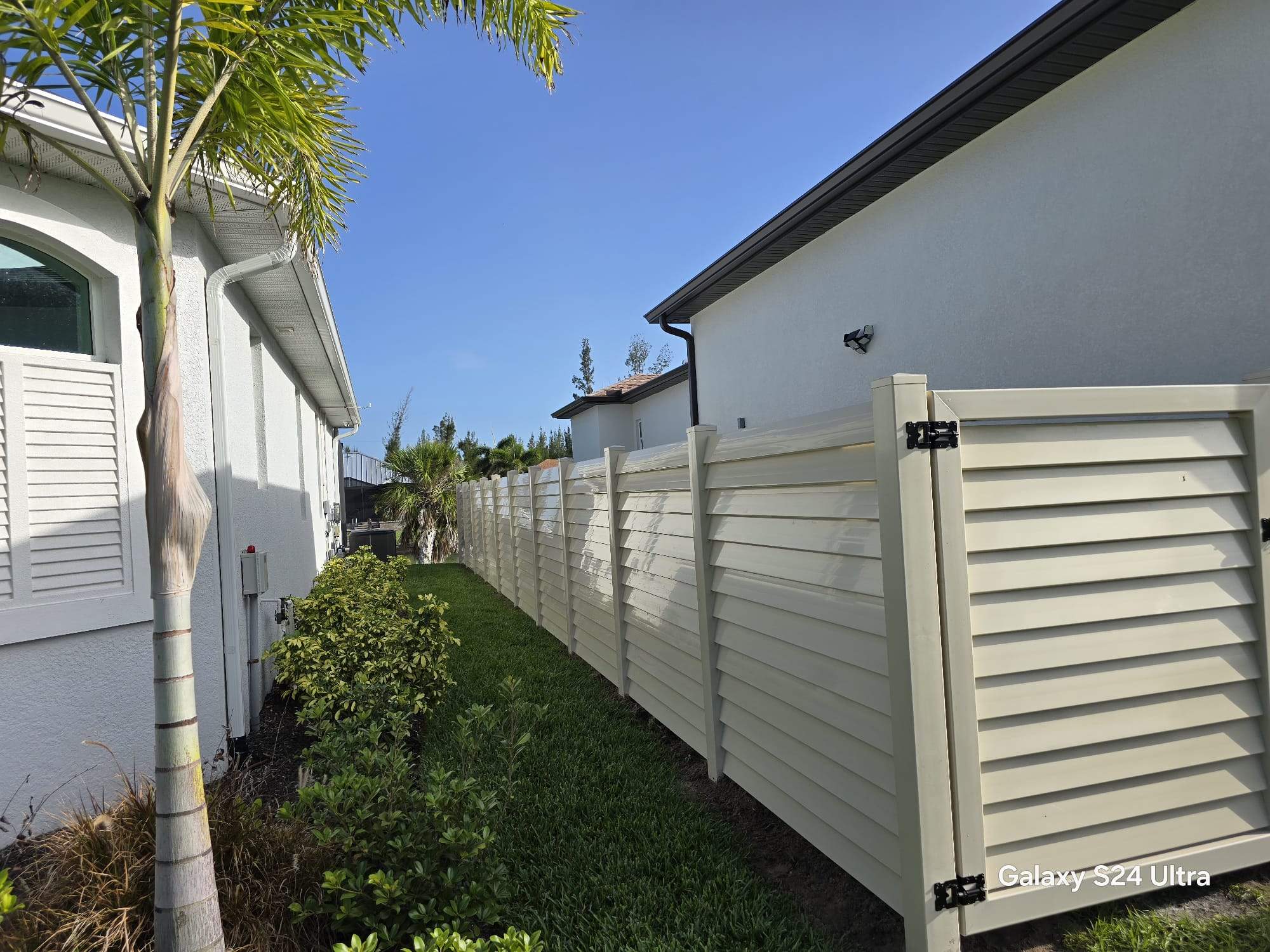 Tan Louvered Vinyl in Port Charlotte by True Fence LLC