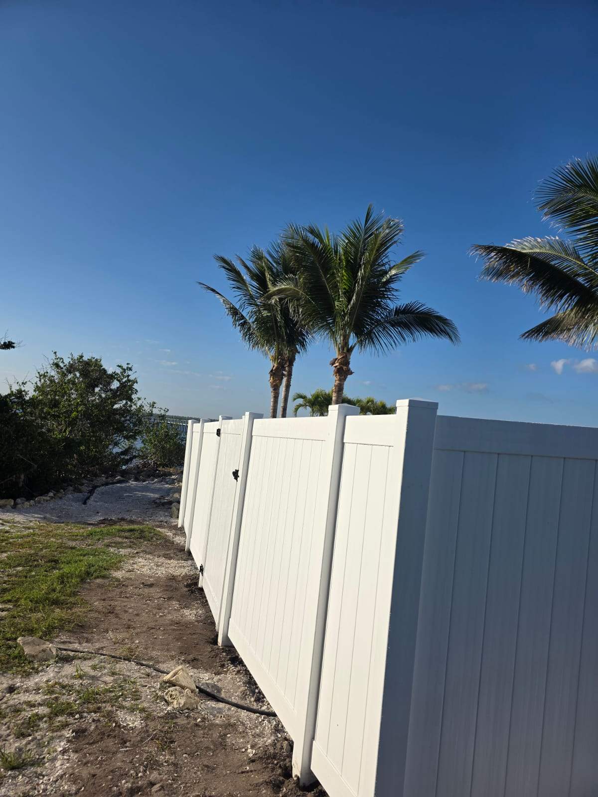 White Aluminum Railing Installation for Commercial Property in Port Charlotte by True Fence LLC