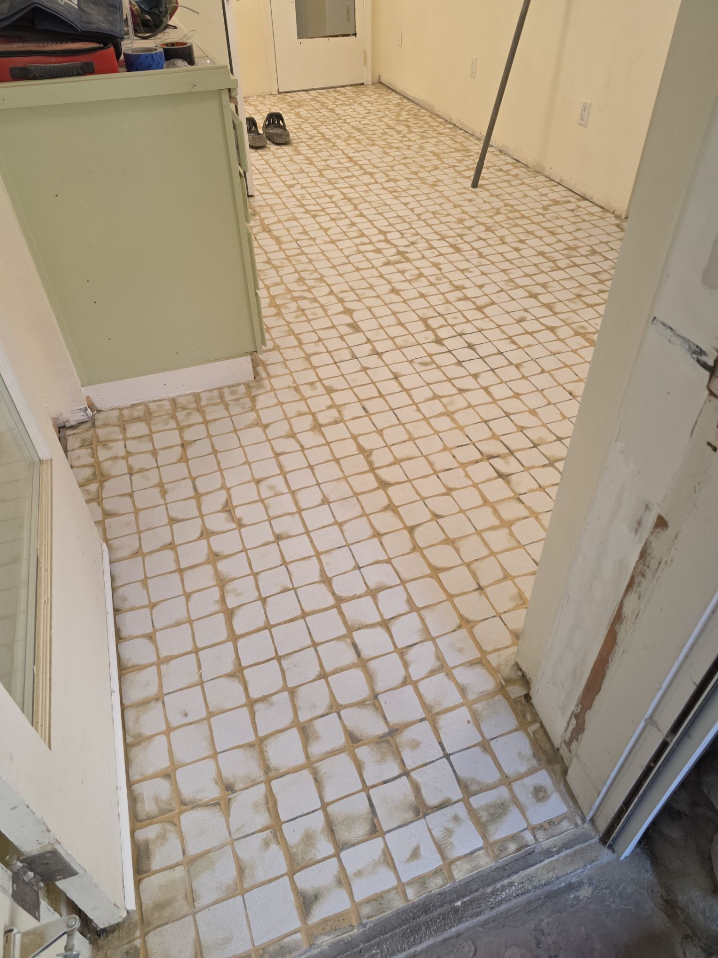 Quartzite Hybrid Flooring Transformation for a Kennewick Utility Room by Croc Coatings, LLC