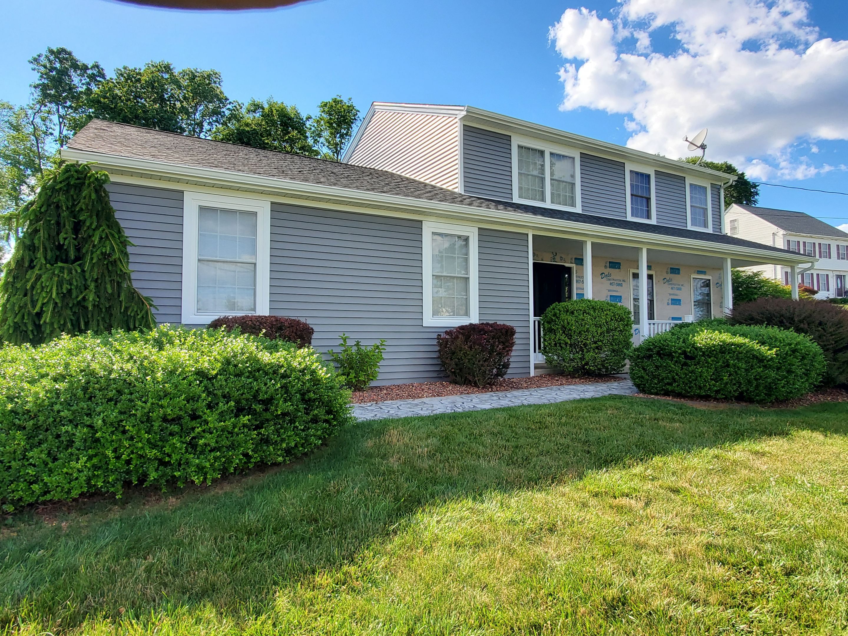 Siding Installation using Certainteed Monogram Charcoal gray and Owens Corning Versetta Stone Sterling by A Plus Exterior