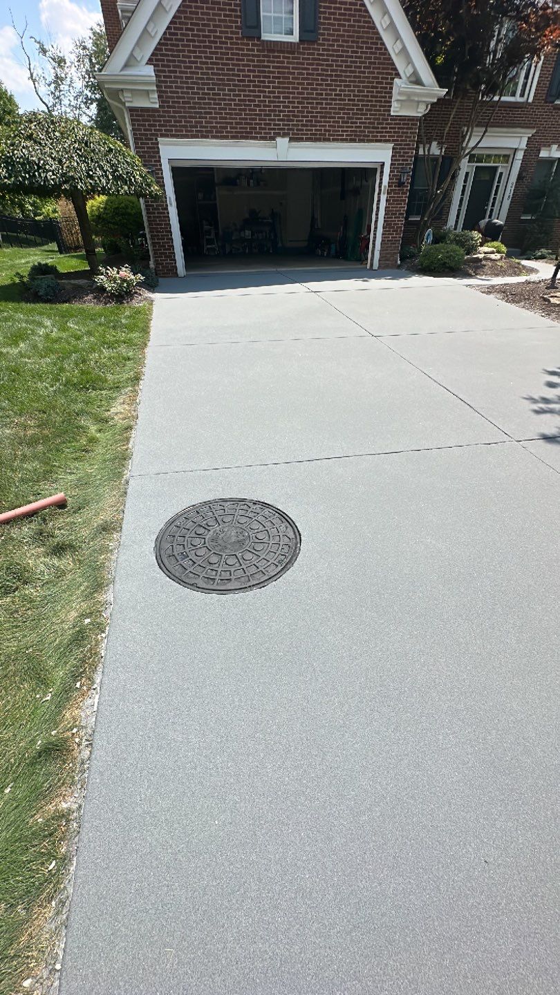 Pool Deck + Driveway + Garage Project in Venetia by Floors in a Day, Inc