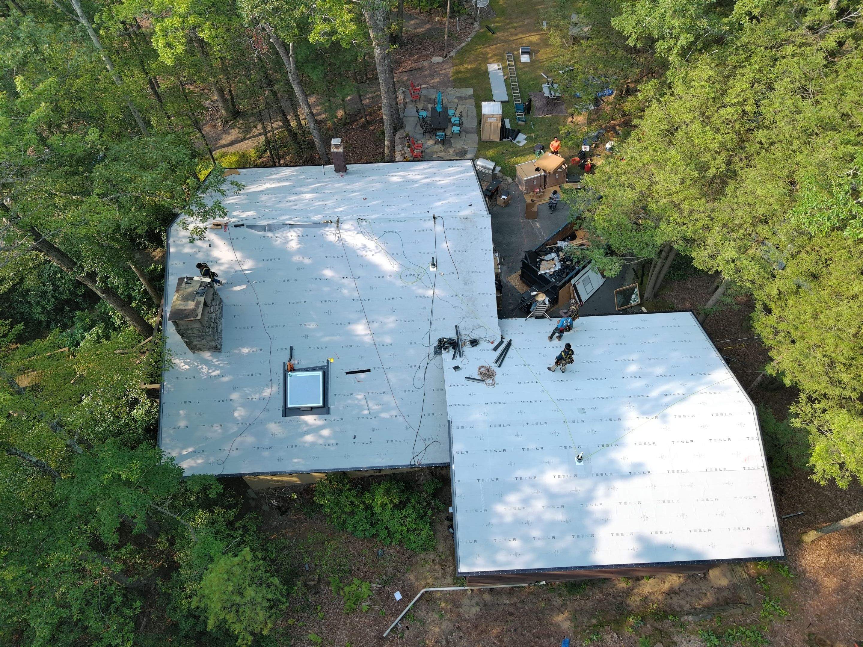 Stunning Tesla Solar Roof Cabin in the Woods by American Home Contractors