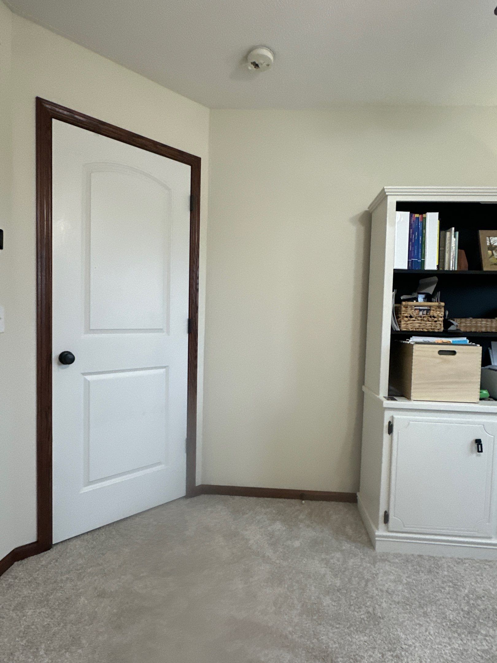 Home Office Remodel Featuring Custom Cabinetry and Dark Wood Trim by CompanyCam Sales Demo