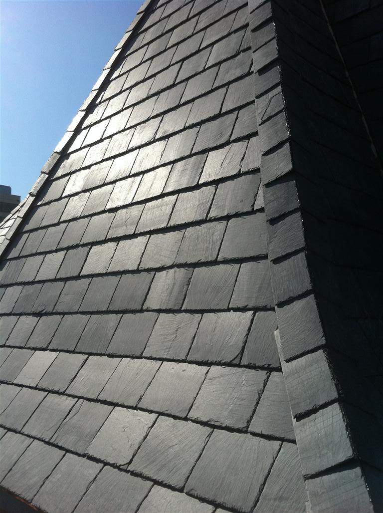 Historic Building ROOF REPLACEMNT with GAF TruSlate  on steep slop and Versico 60mil TPO on flat roof by Gorilla Exteriors Contracting, LLC