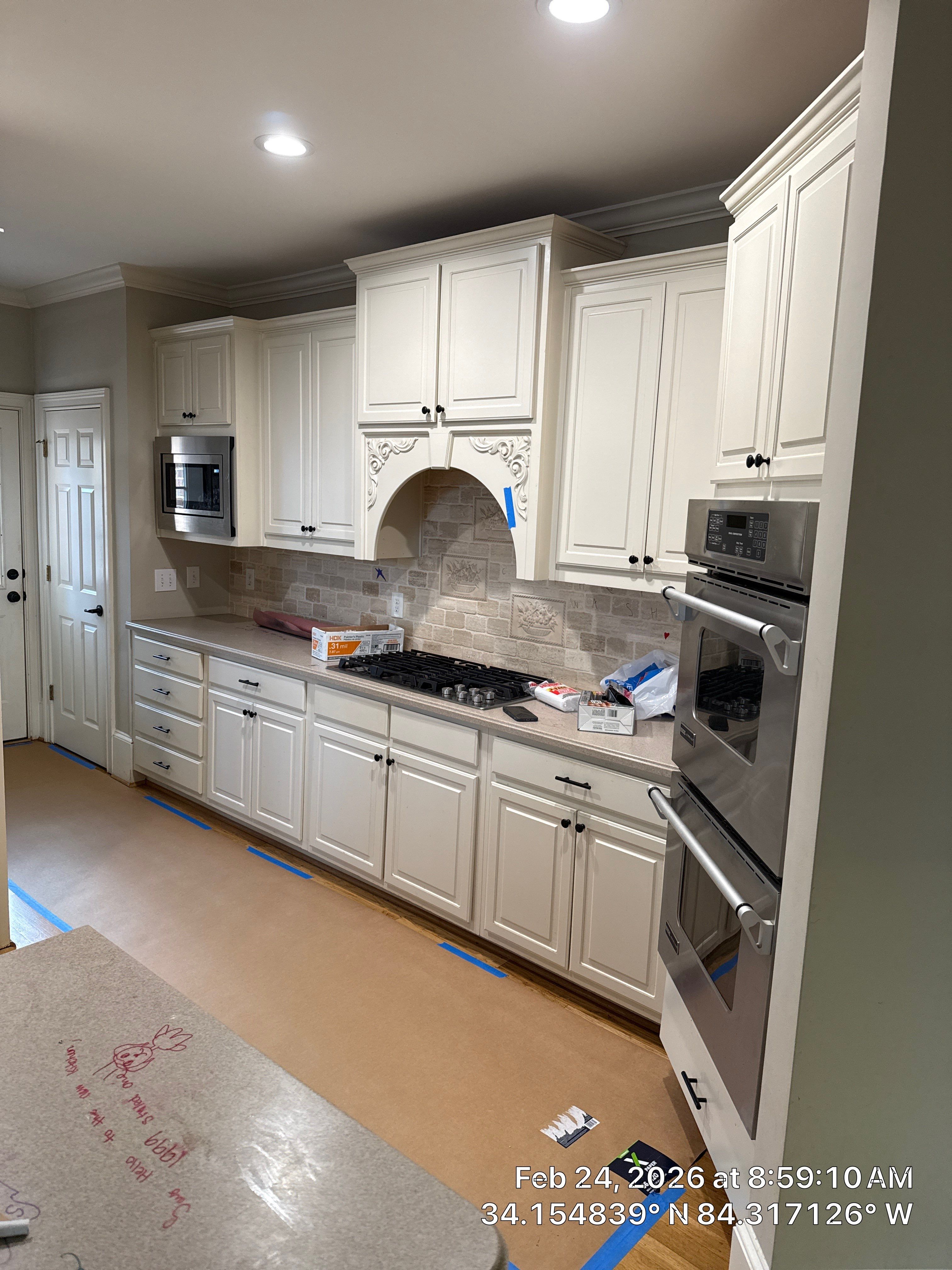 Alpharetta Kitchen Remodel Featuring Double Islands and White Quartz by Heart & Home Kitchen & Bath Remodeling LLC