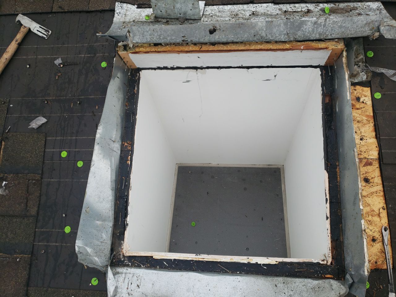 Skylight Removal using Shingle Repair by The Roof Doctor