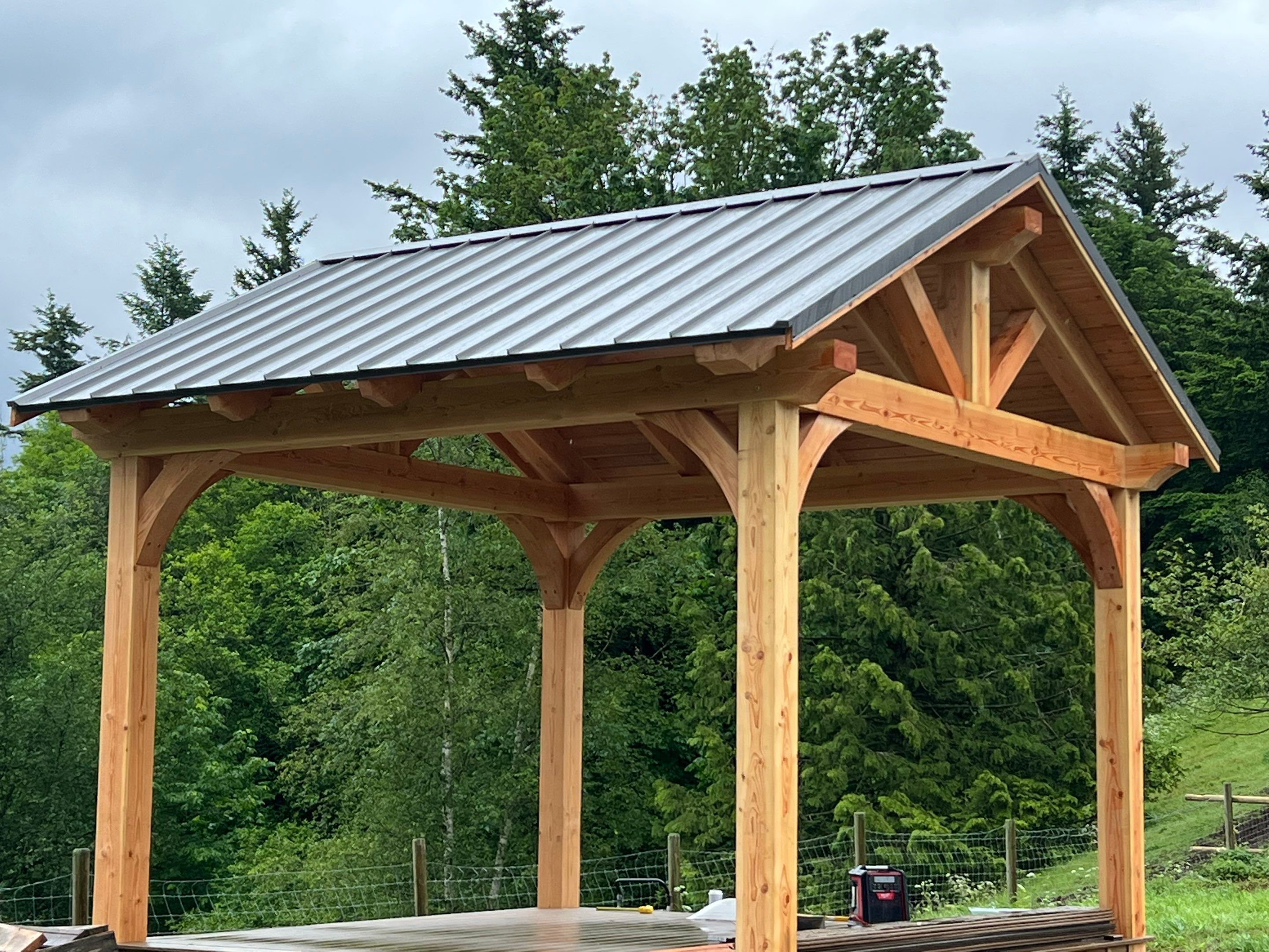 Commercial Roofing Installation using corrugated metal by Top Notch Roofing Inc