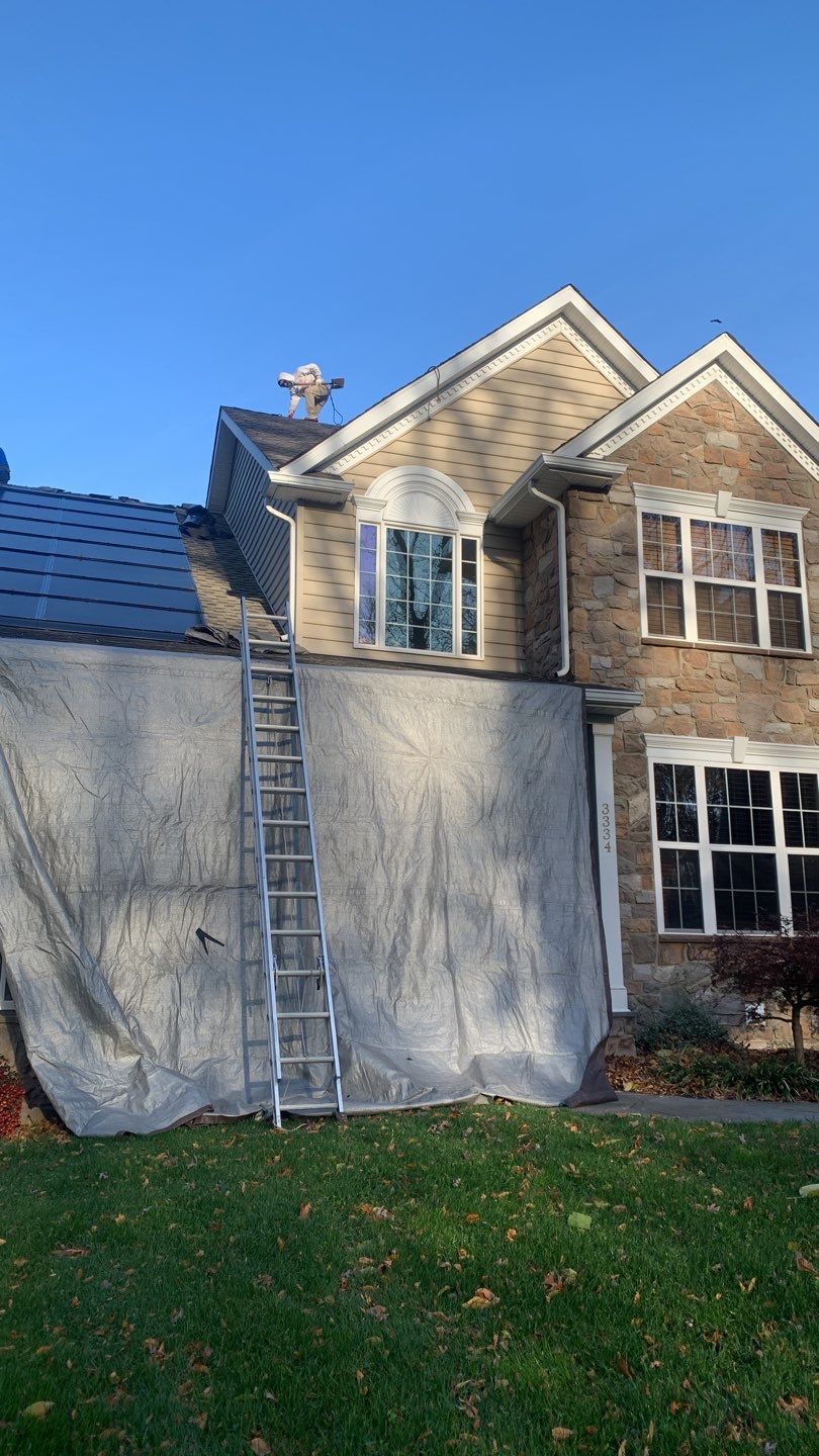 Tesla Solar Roof Replacement by American Home Contractors