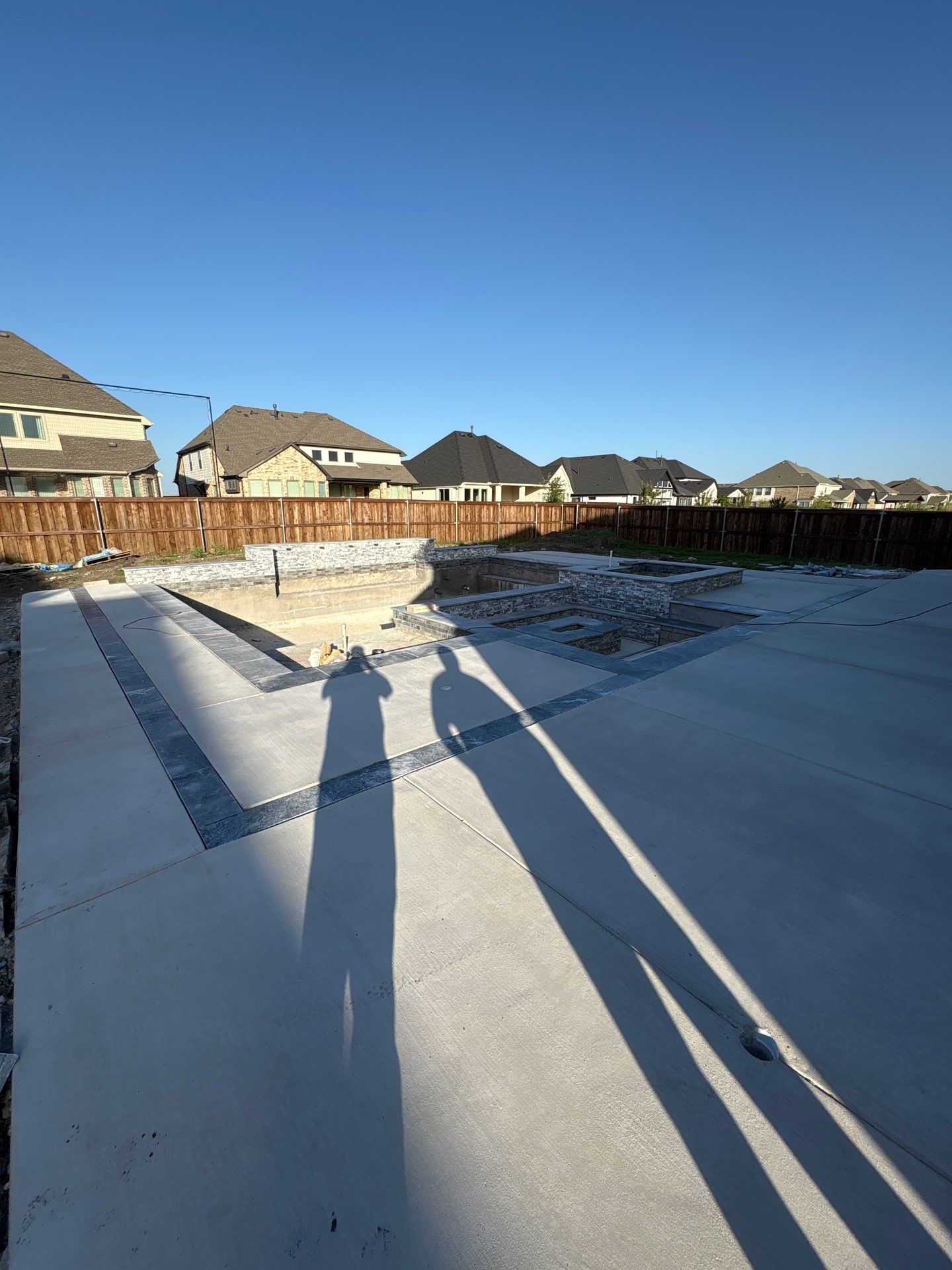 Geometric Pool with Raised Spa and Scupper Water Features by Pinnacle Pools and Spas - DFW