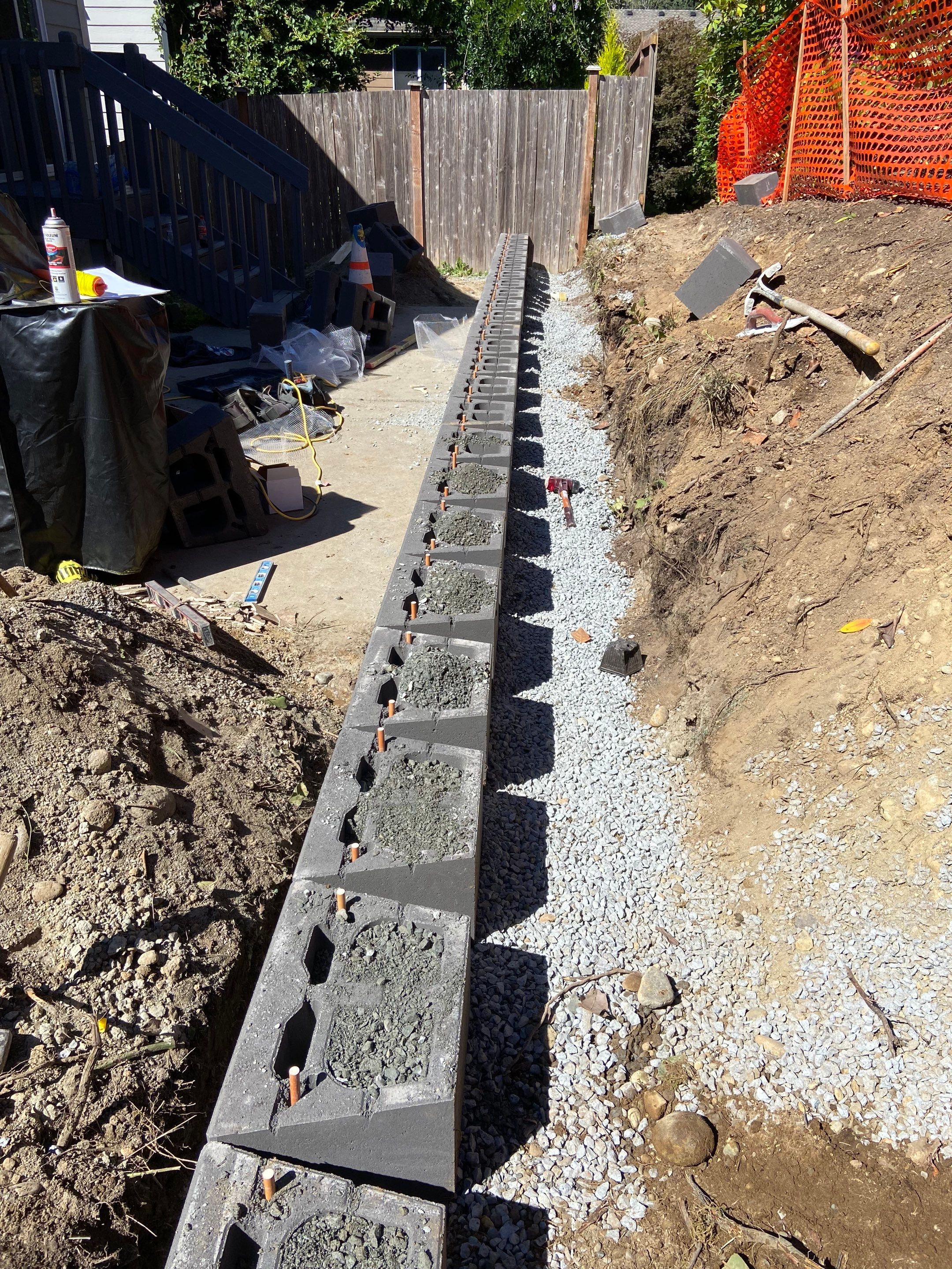 Jireh Outdoor Projects | Retaining Wall & Fence Build by Jireh Asphalt & Concrete Inc 