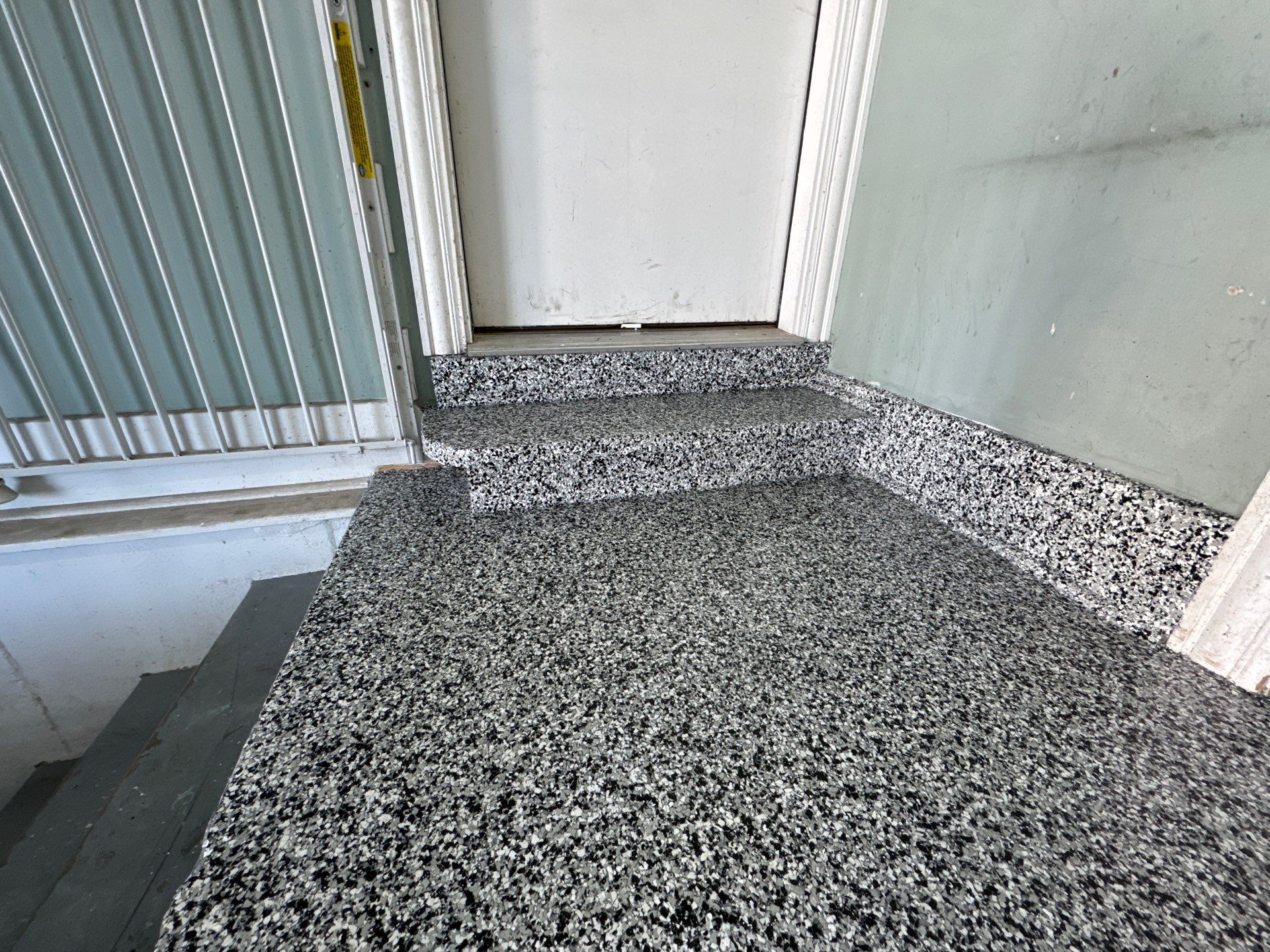 Domino Garage Floor Coating by Level 10 Coatings