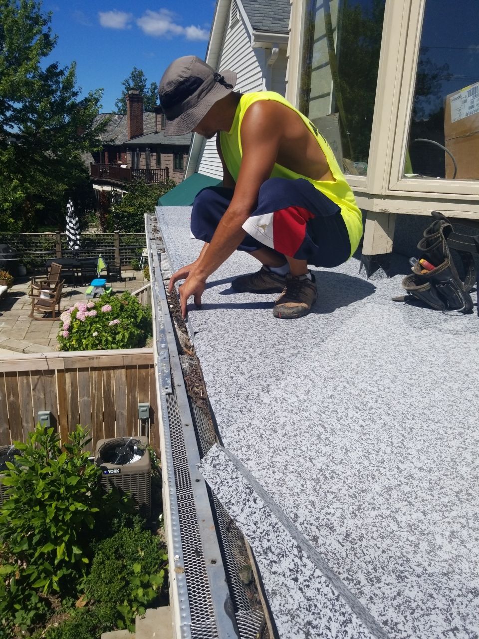 Residential Roofing Installation, Dec-tek walk-out porch roof, siding on garage by Absolute Roofing and Construction