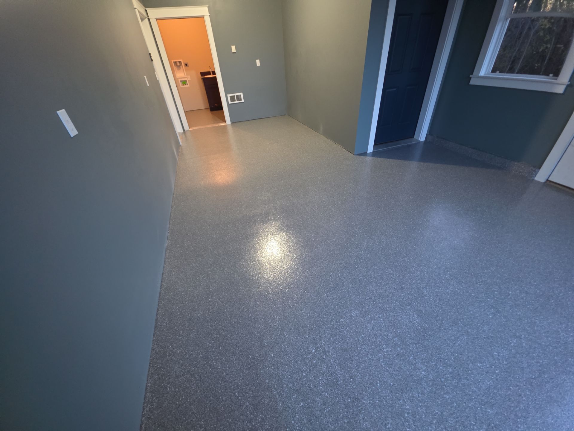 Garage Transformation using Turquoise Hybrid by Croc Coatings, LLC