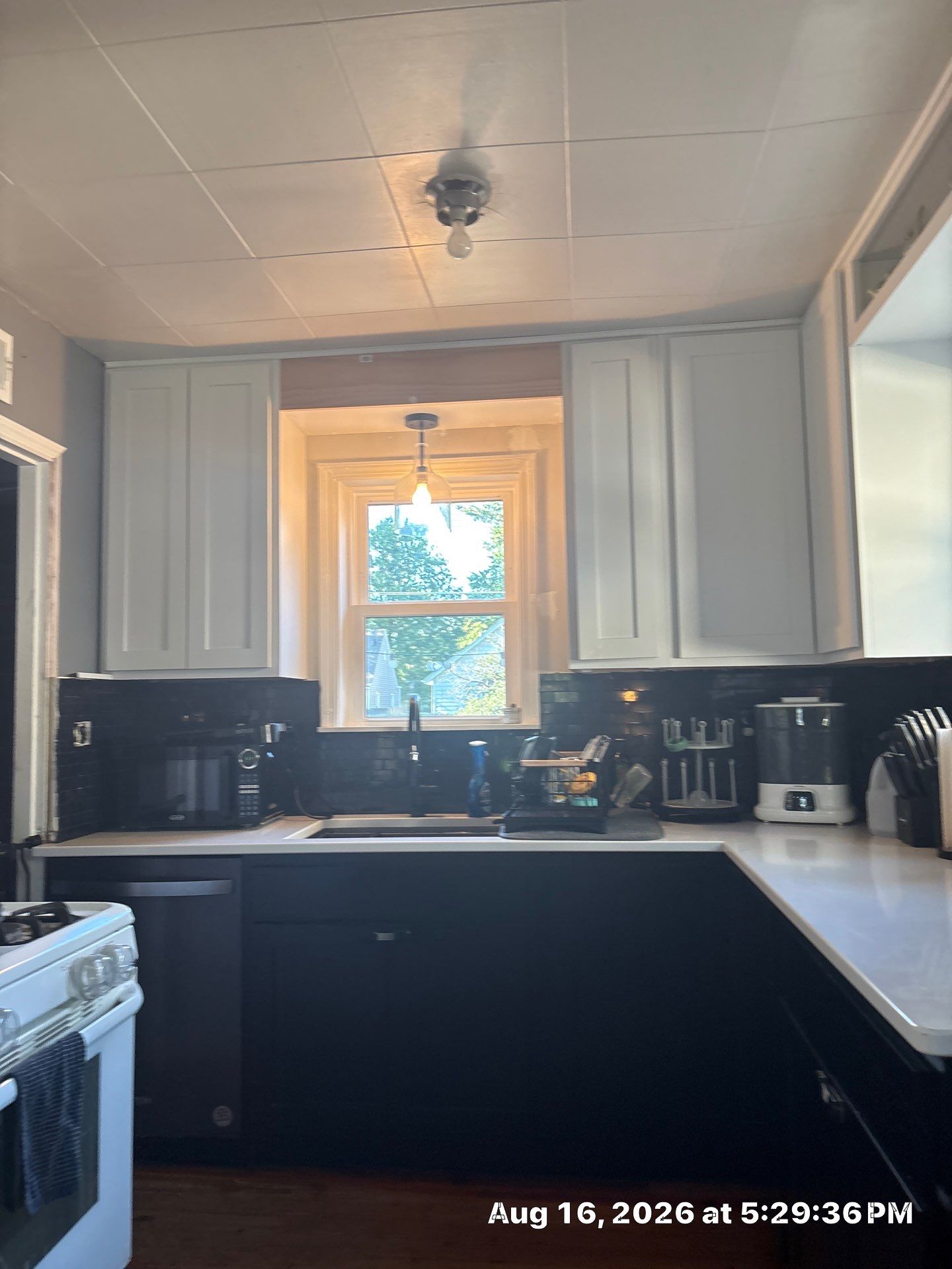 Modern Two-Tone Kitchen Remodel With Quartz Countertops in Lincoln by CompanyCam Sales Demo