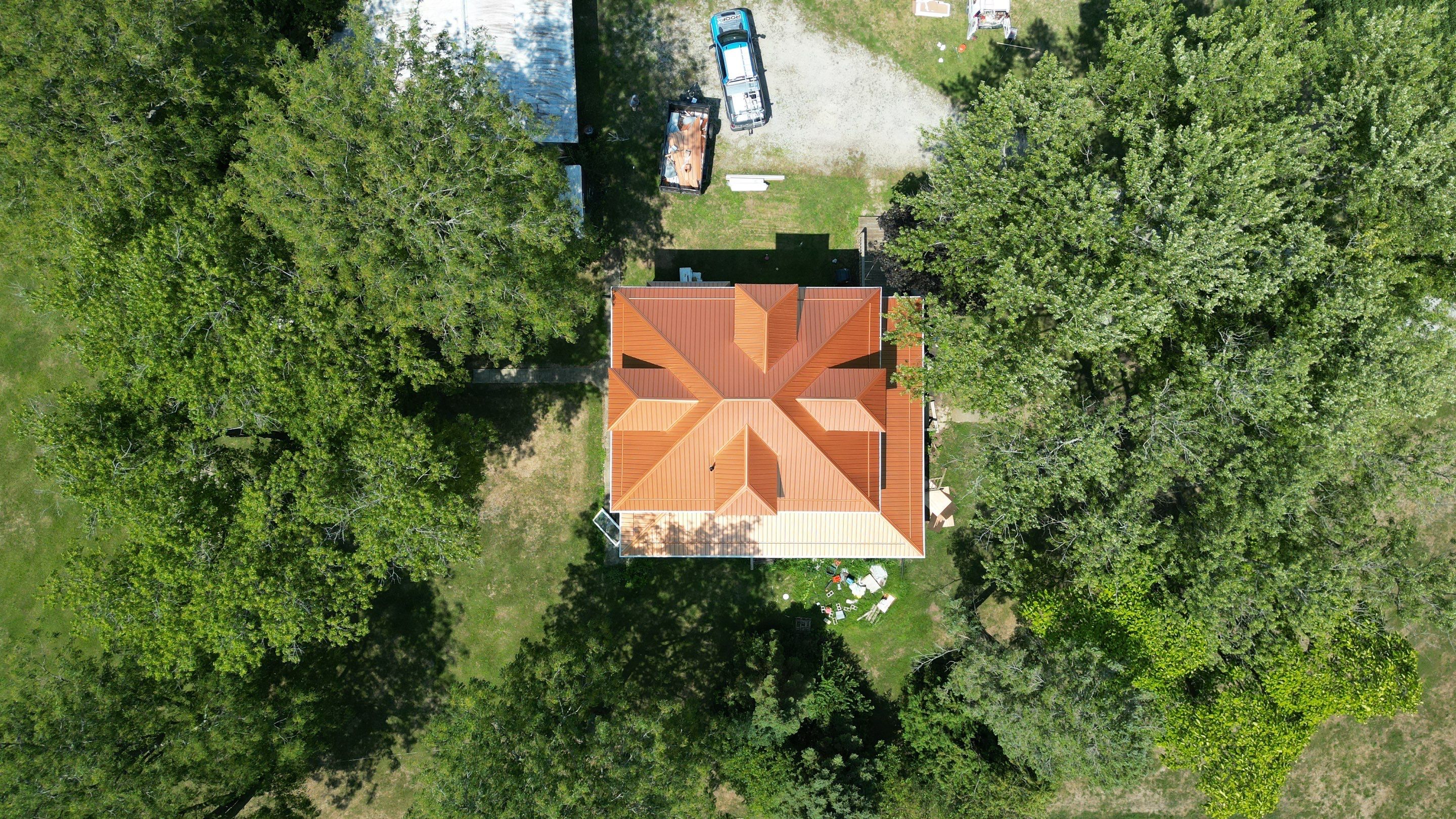 Residential Roofing Installation using Performance Panel Metal - Copper Metallic by RoofX 