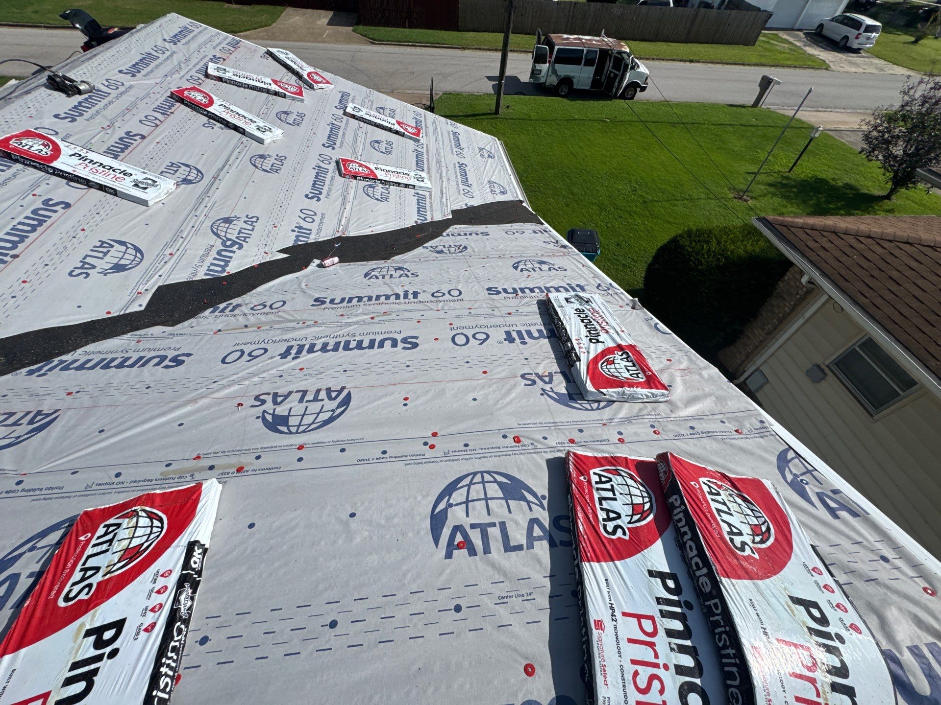 Residential Roof + Gutters & Downspouts & Gutter Guards Replacement  by Titan Commercial & Residential Roofing 