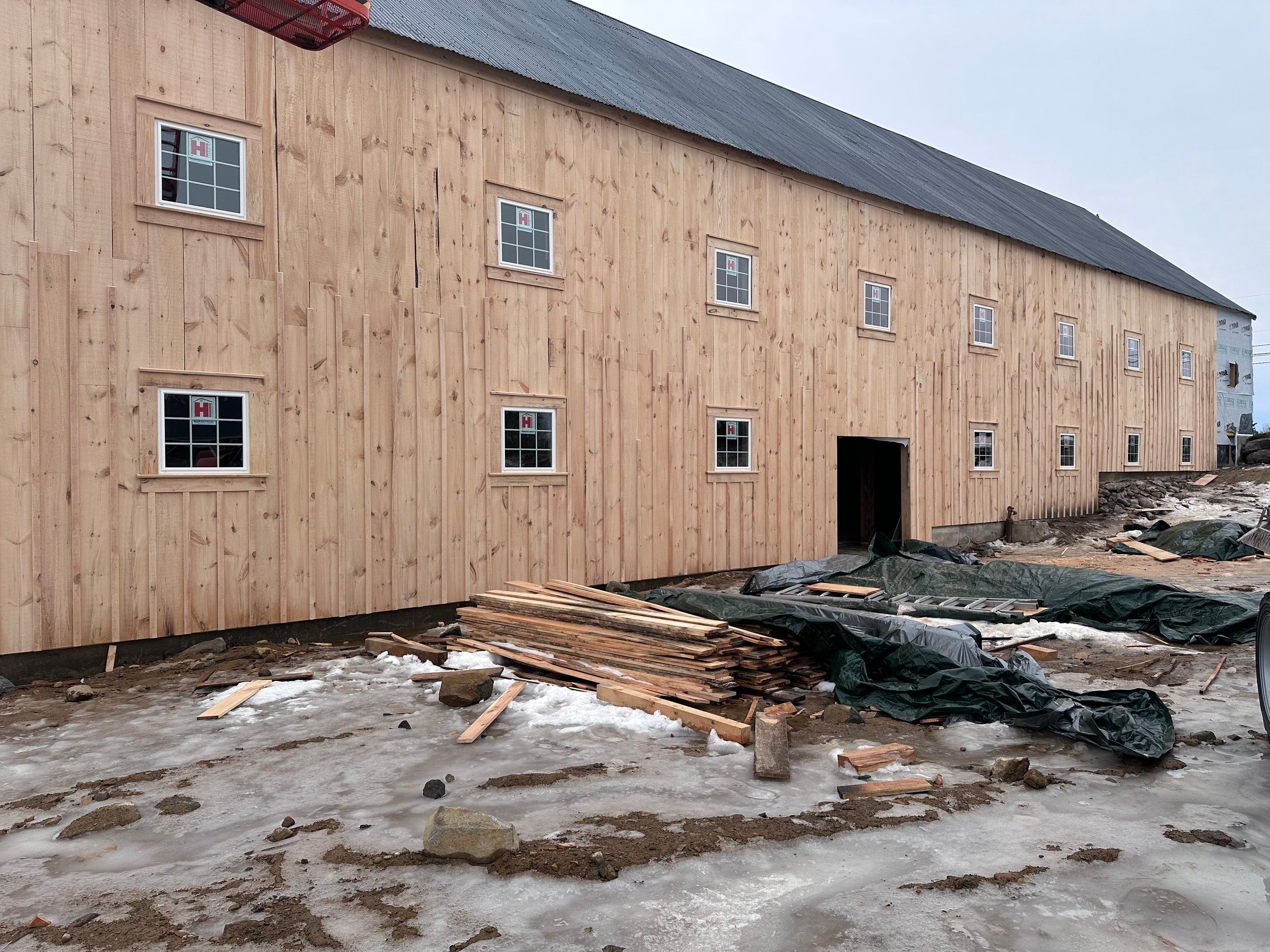 Barn Restoration and Board-and-Batten Siding Installation in Hansons Ridge by B's Roofing & Construction LLC