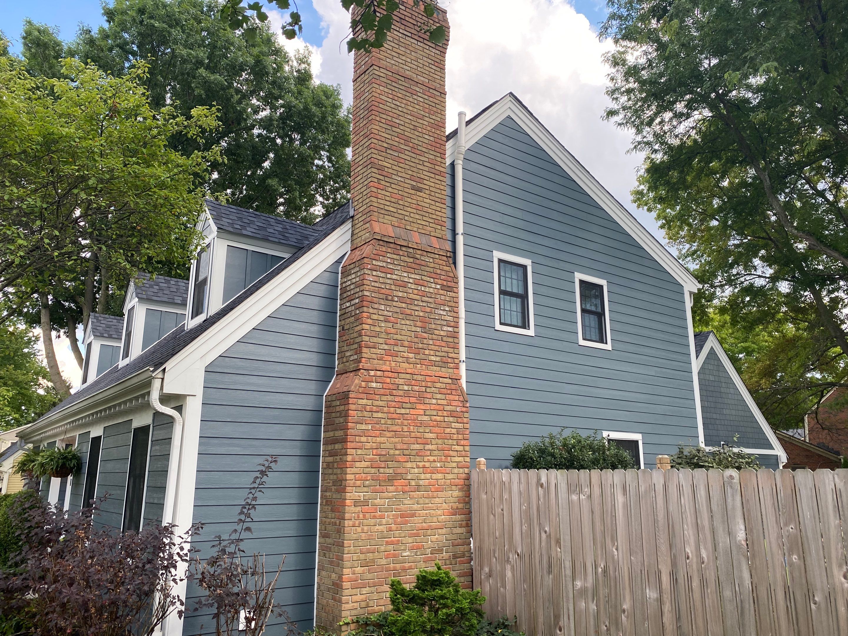 Residential Roofing Installation using James Hardie Fiber Cement Lap Siding and Certainteed Landmark Pro Shingles by Best Exteriors Inc