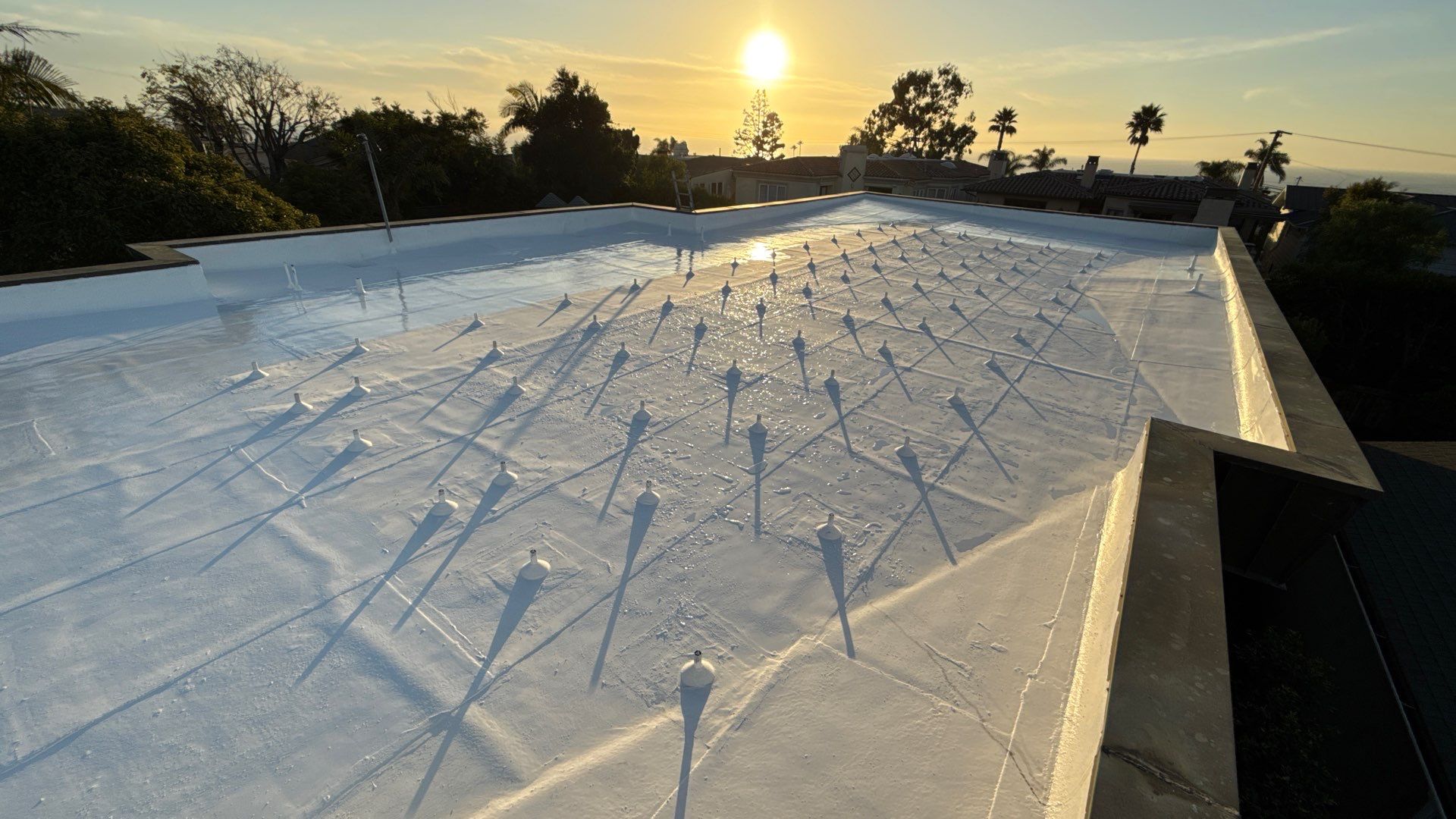 Residential Roofing Installation using ASC Silicone Membrane by Hull Brothers Roofing