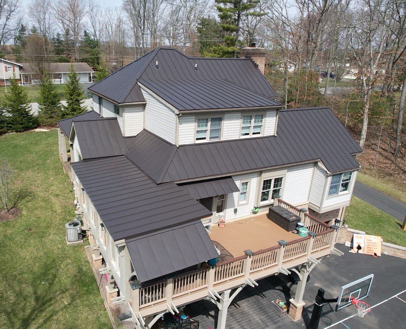 Metal Roof Replacement  by American Home Contractors