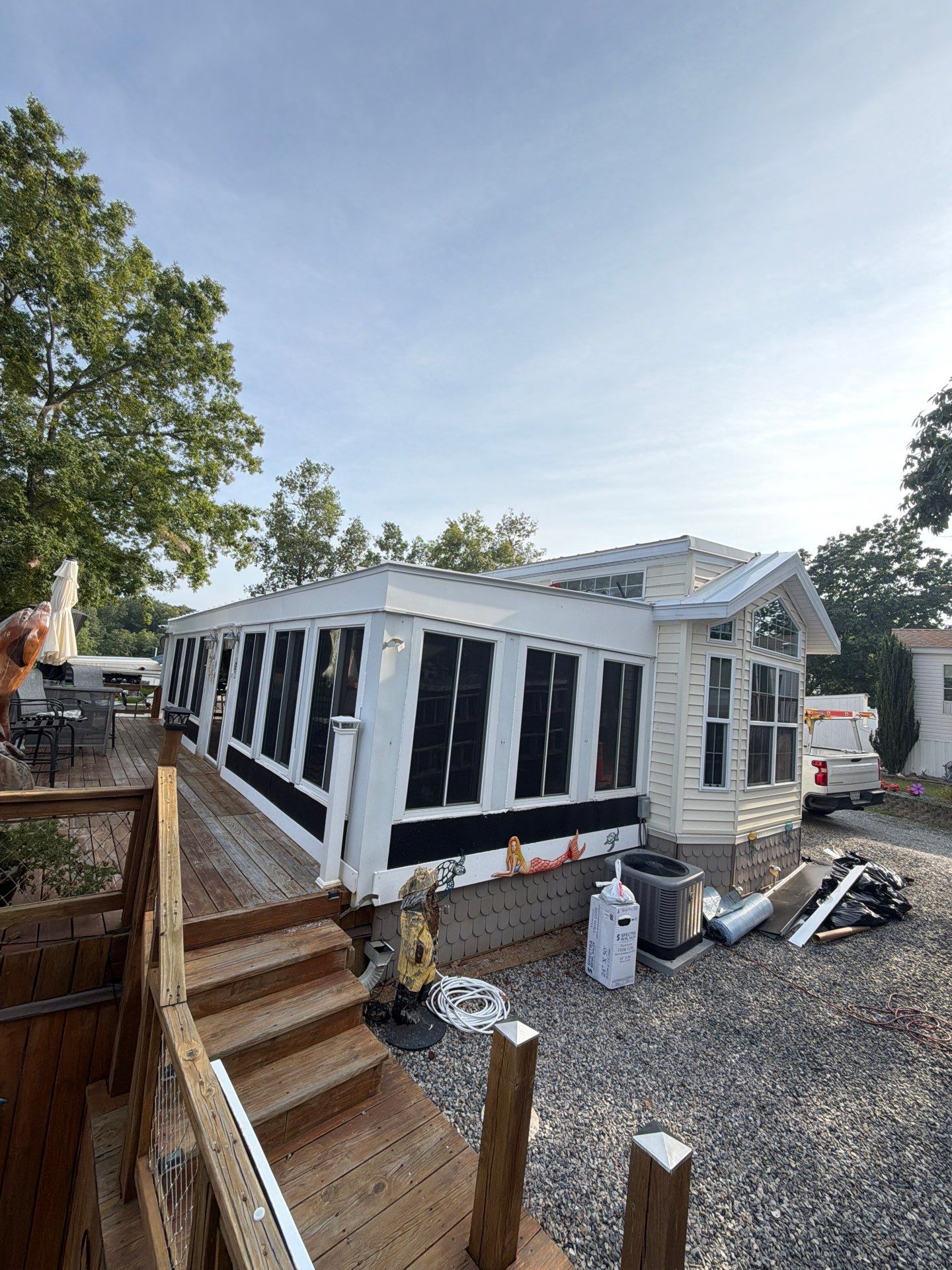 White Standing Seam Metal Roof Installation in Wake, VA by Cade Construction