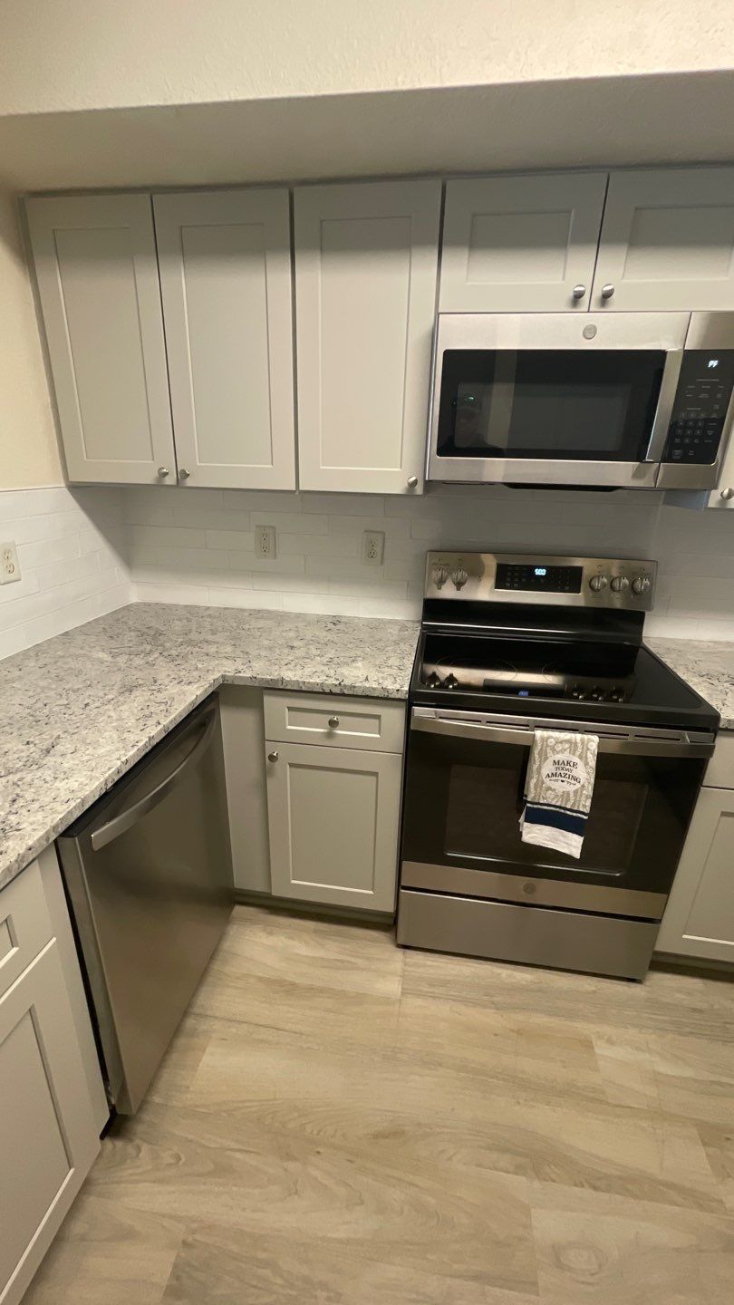 Home Remodel using LVP Flooring and Cabinets by HandyMangum