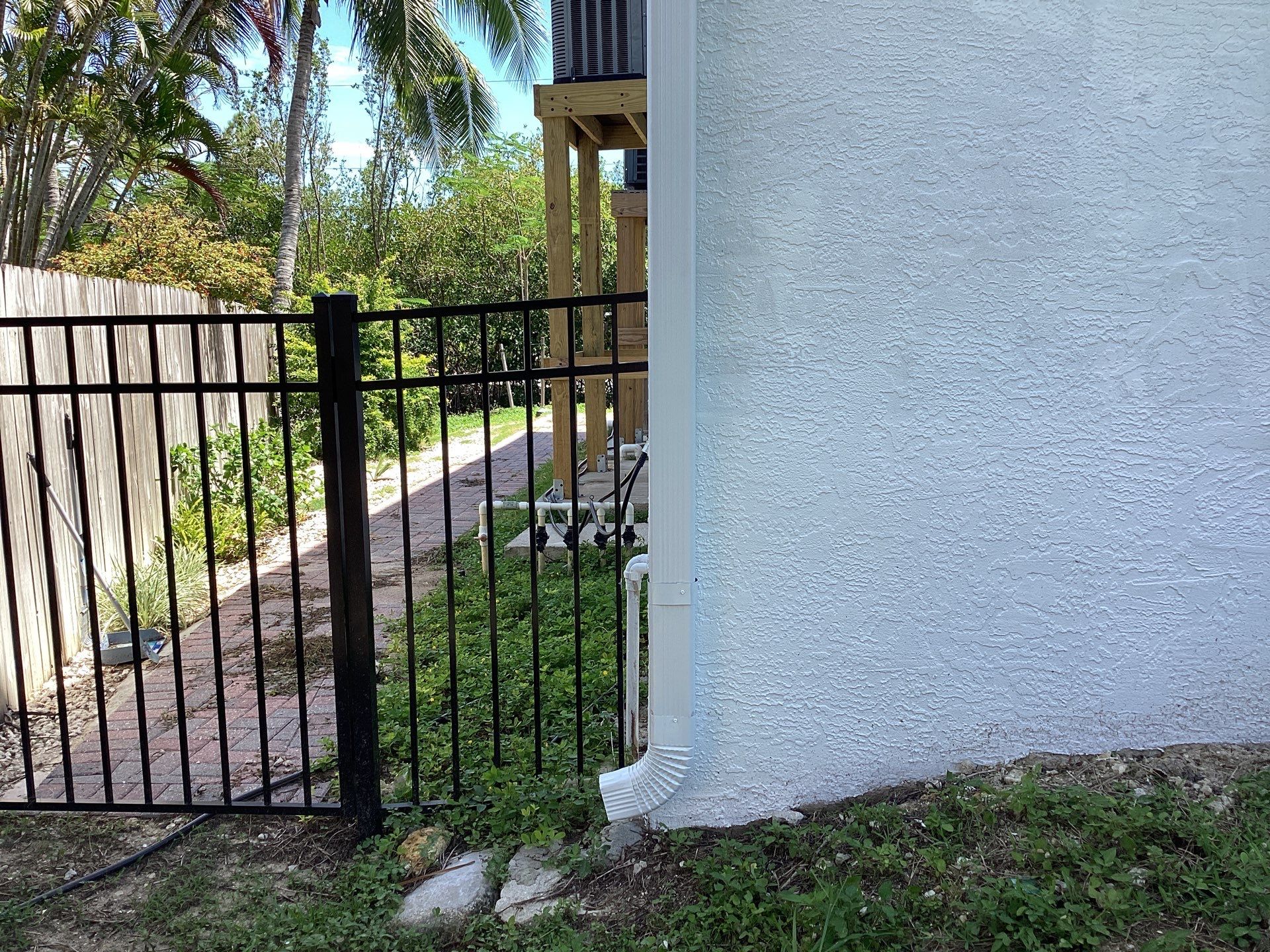 Downspout Extensions for Flood Prevention in Fort Myers FL by Gutter Professors