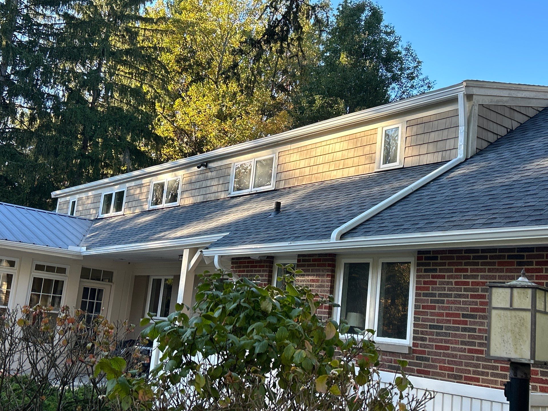 Moreland Hills Roof + Gutters Replacement by Atlas Roofing & Restoration