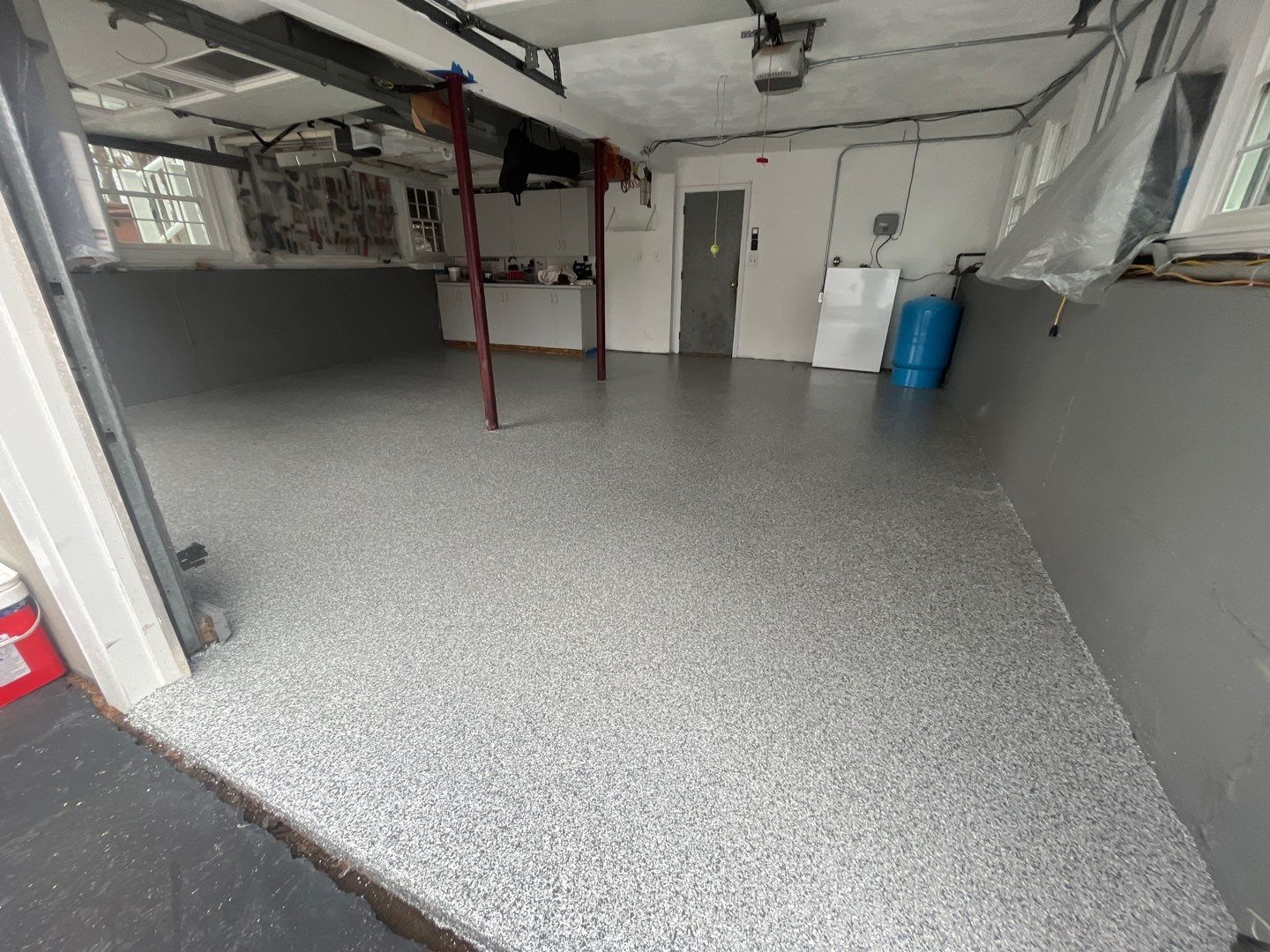Maestranzi Garage TransFLOORmation by Symphony Concrete Coatings