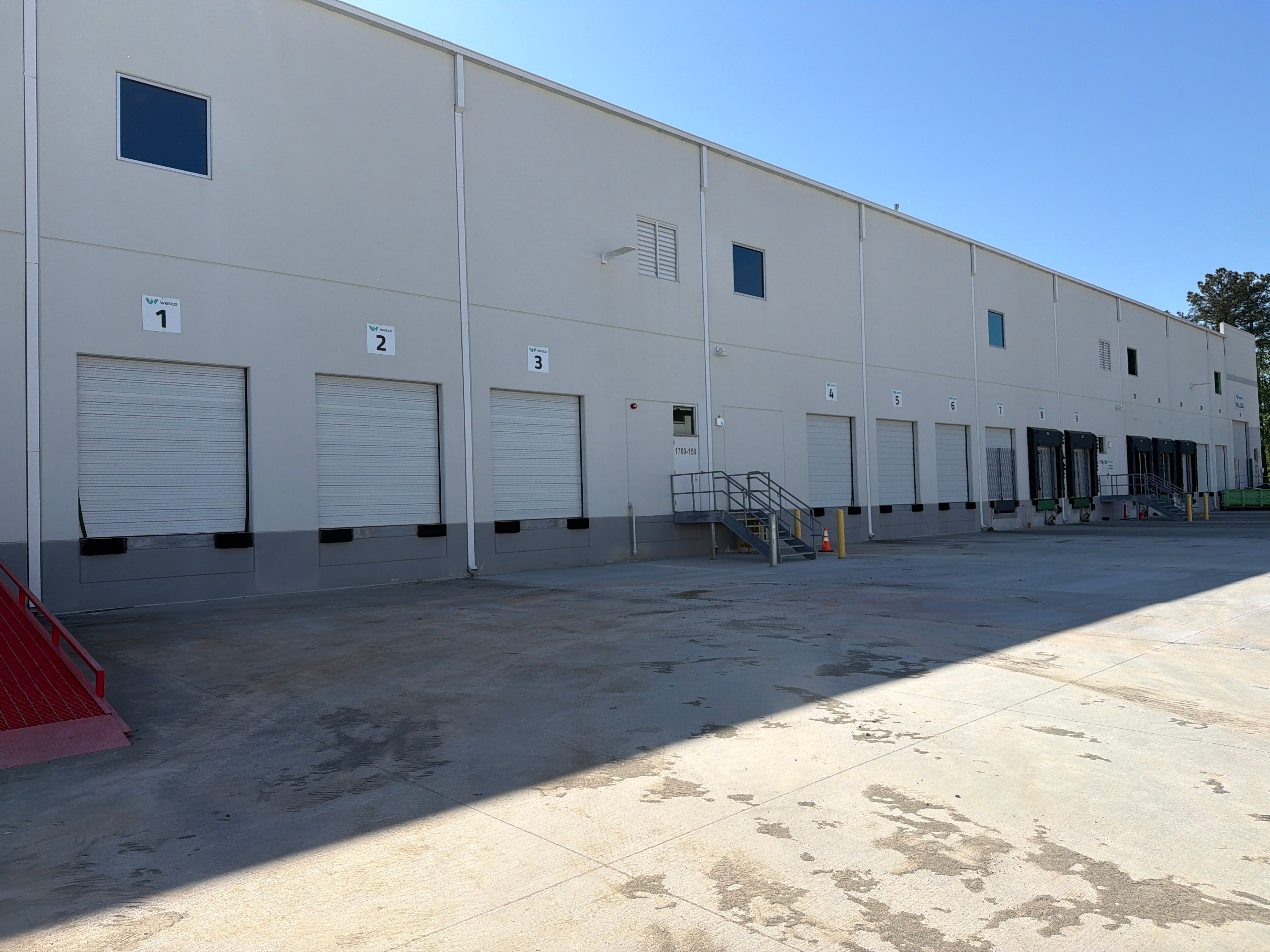Exterior Commercial Improvements – Parking Lot & Wall Painting by Billy Weatherspoon Contractor