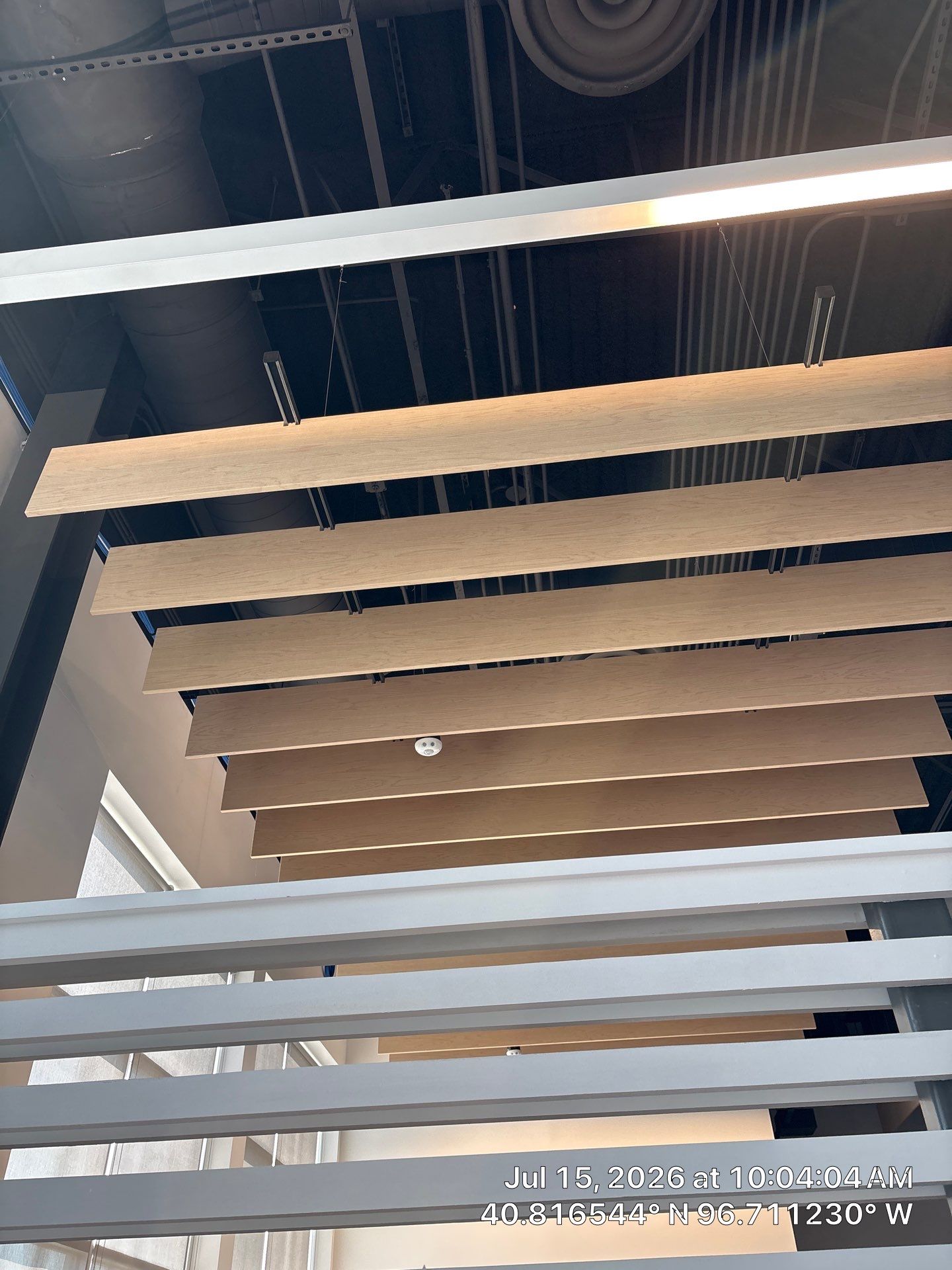 Modern Office Remodel with Wood Ceiling Baffles in Lincoln by CompanyCam Sales Demo