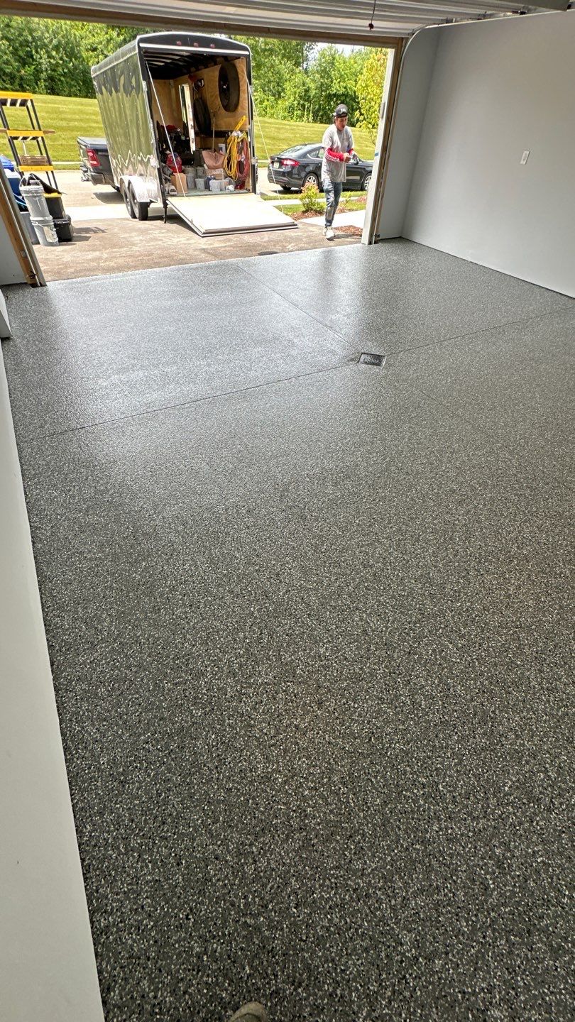 Porch + Garage Project in Evans City by Floors in a Day, Inc