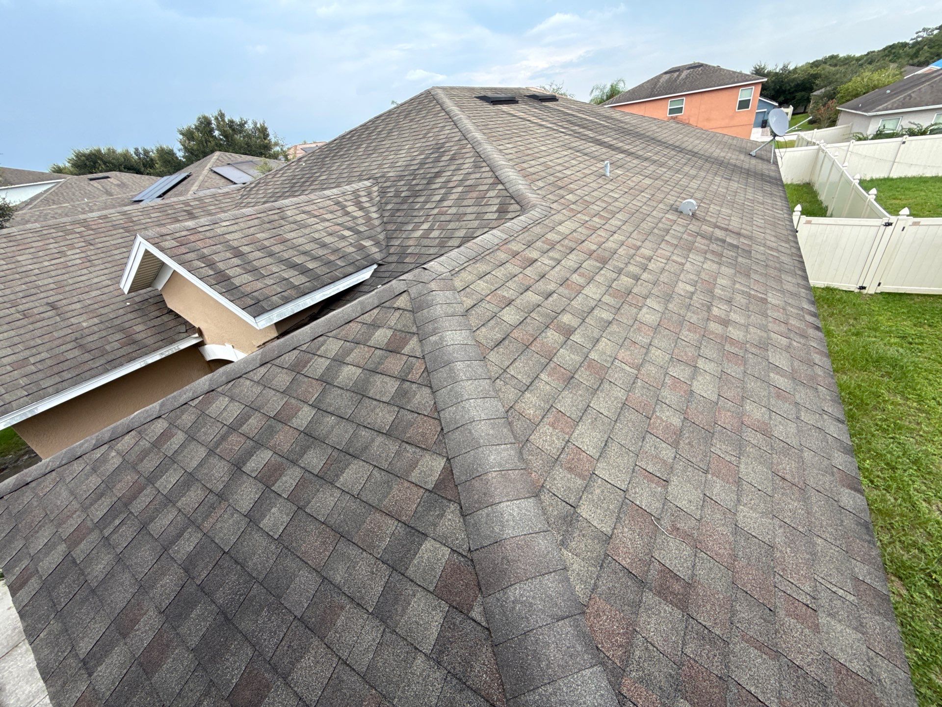 Residential Asphalt Shingle Roof Installation with Solar Ventilation in Davenport by JHI Roofing