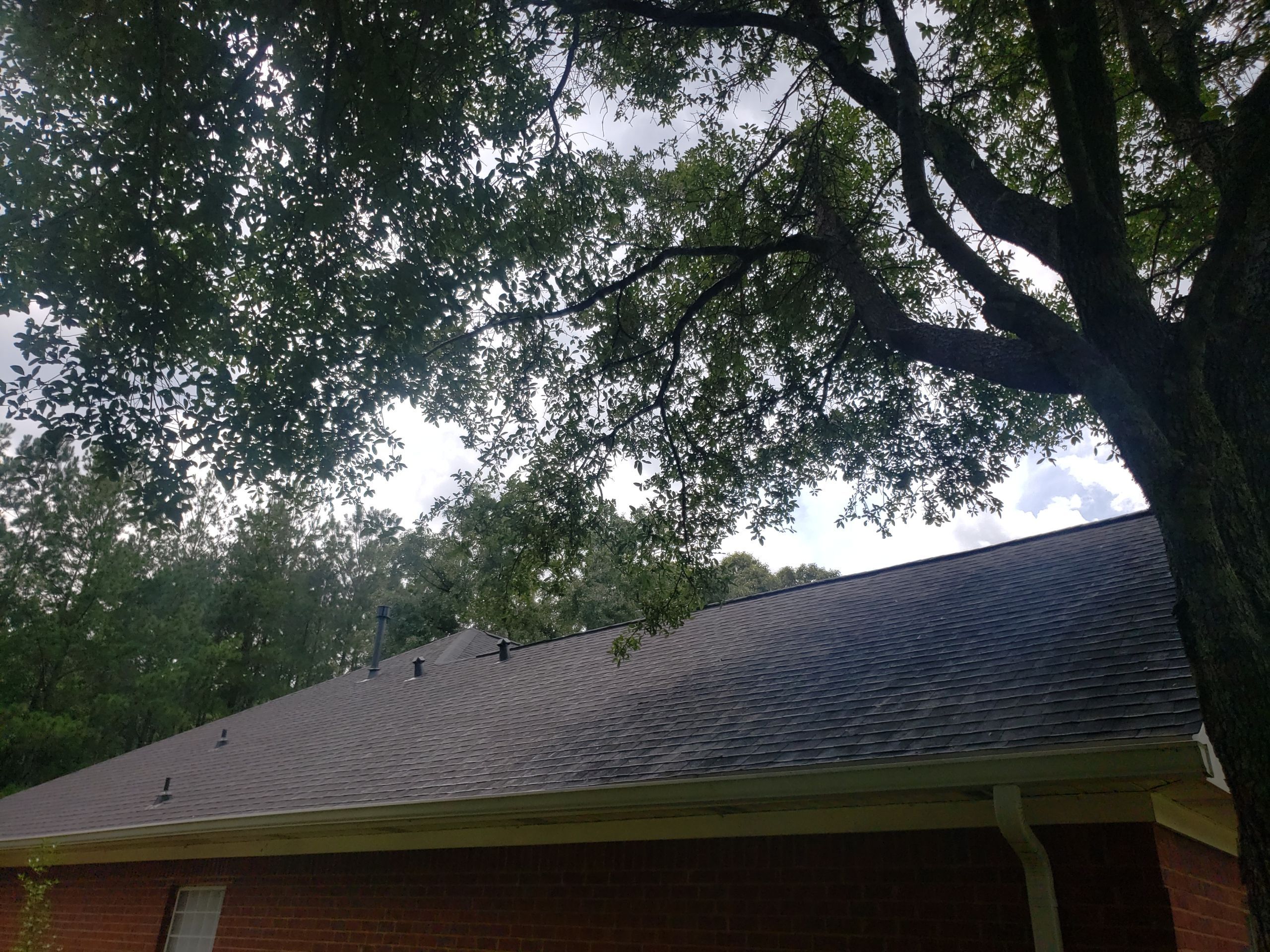 Residential Roofing Installation using Roof Replacement by American Roofing & Construction LLC