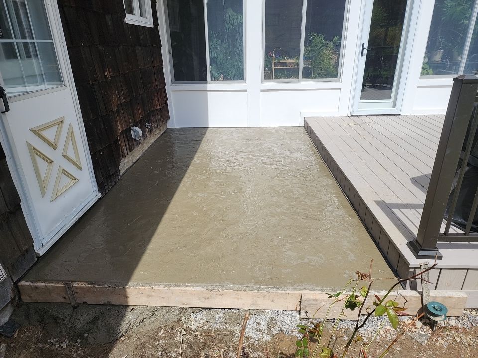Deck and Stamped Concrete by Ivy Lea Construction